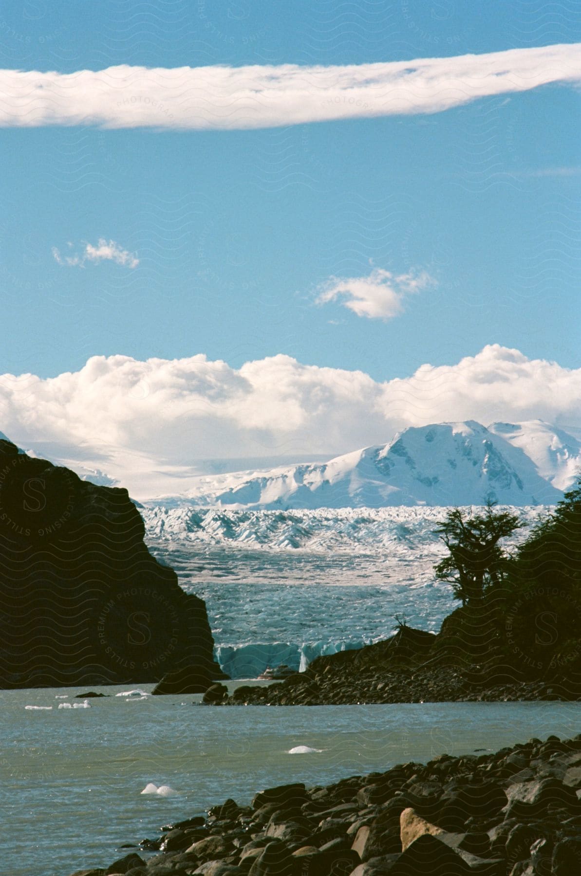 Landscape of glacier bay and snowy mountain in patagonia showcasing the natural beauty of the icy terrain and surrounding water