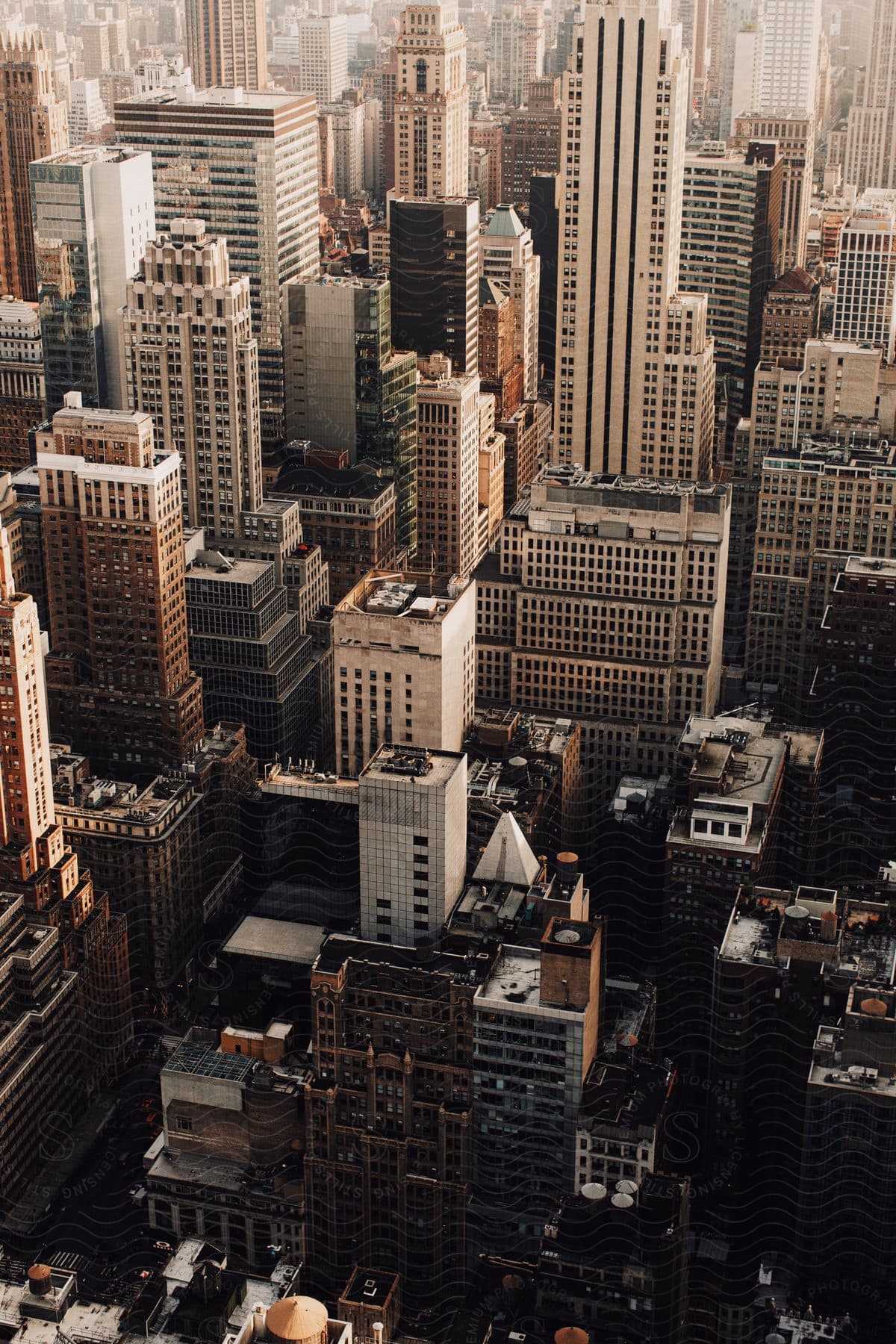 Aerial view of a cityscape with skyscrapers and buildings