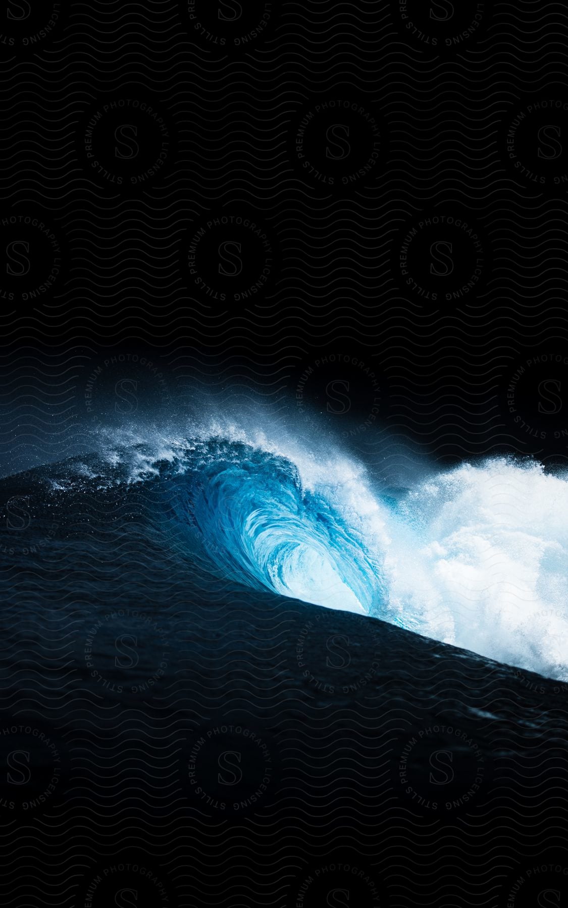 Ocean waves crashing at night