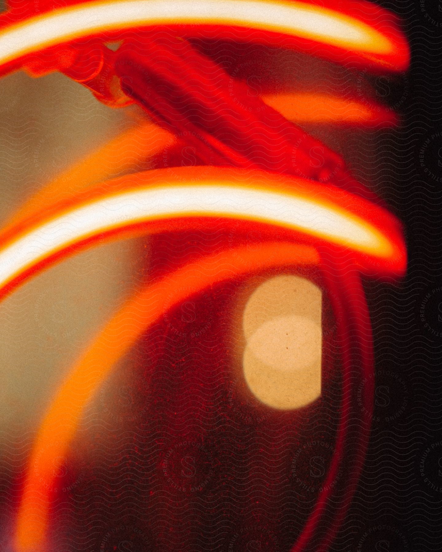 Close up of a red neon sign on a store window at night