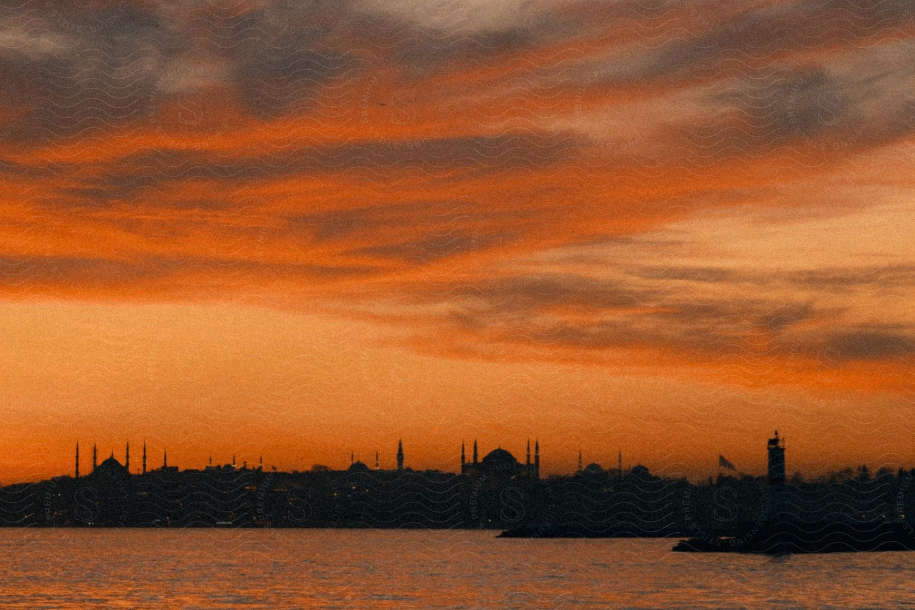 Buildings adorned with radiant rays of light in istanbul creating a dramatic cityscape scene at night time