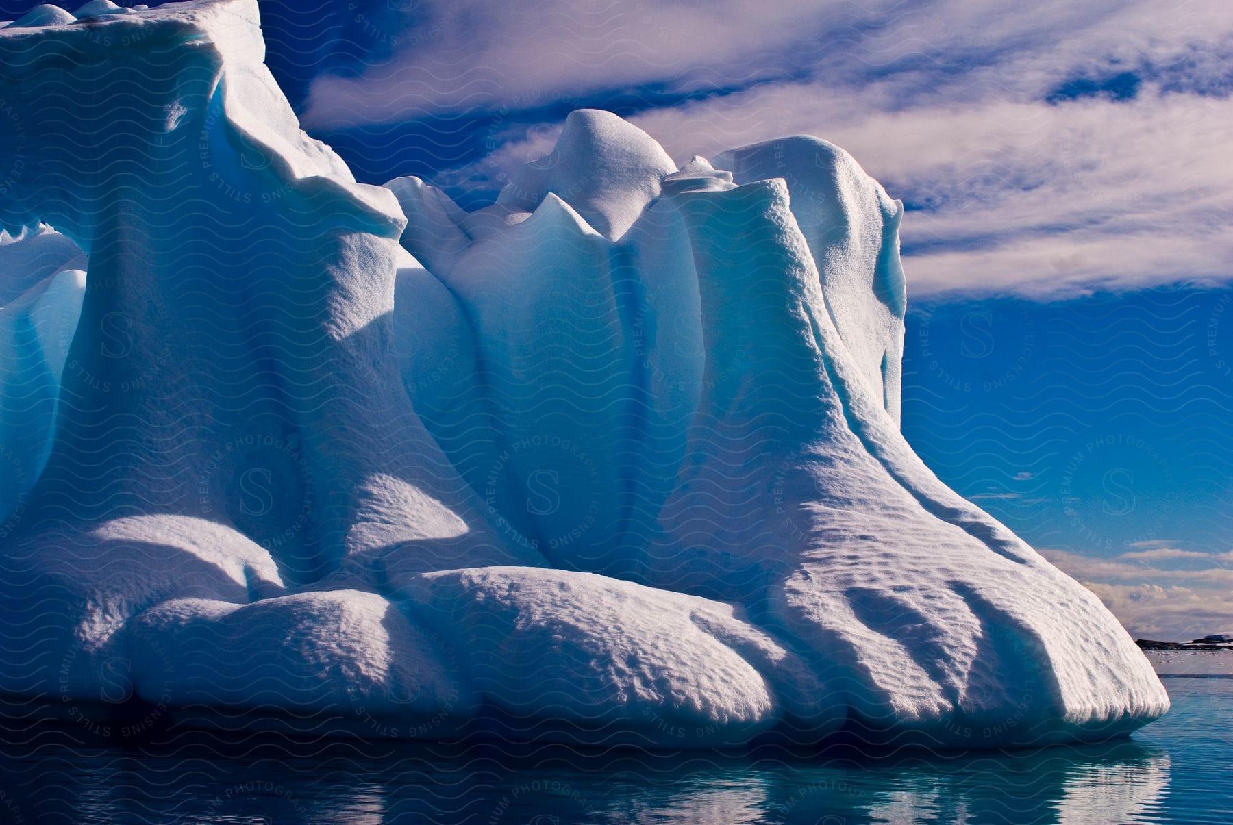 Large iceberg in a watery landscape