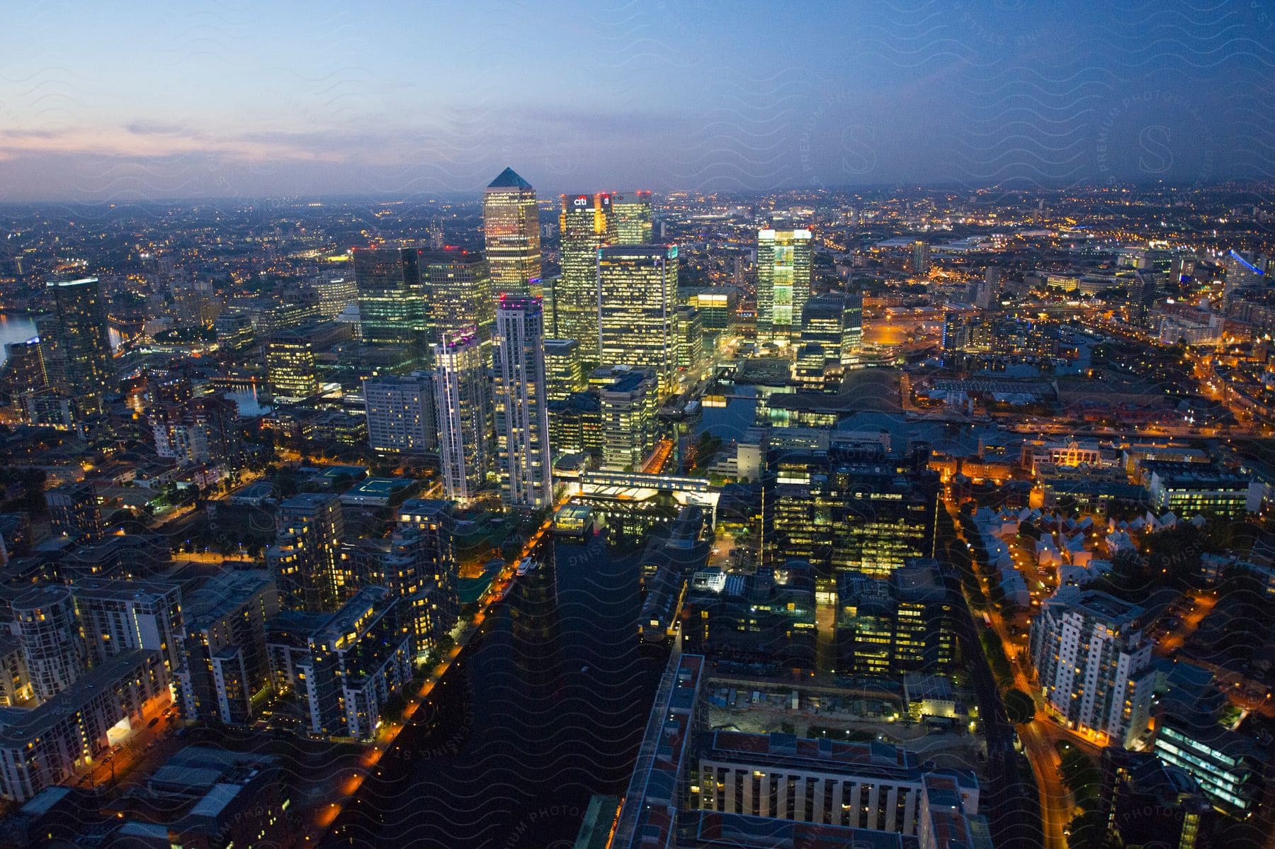 Aerial shot of london with skyscrapers at sunset