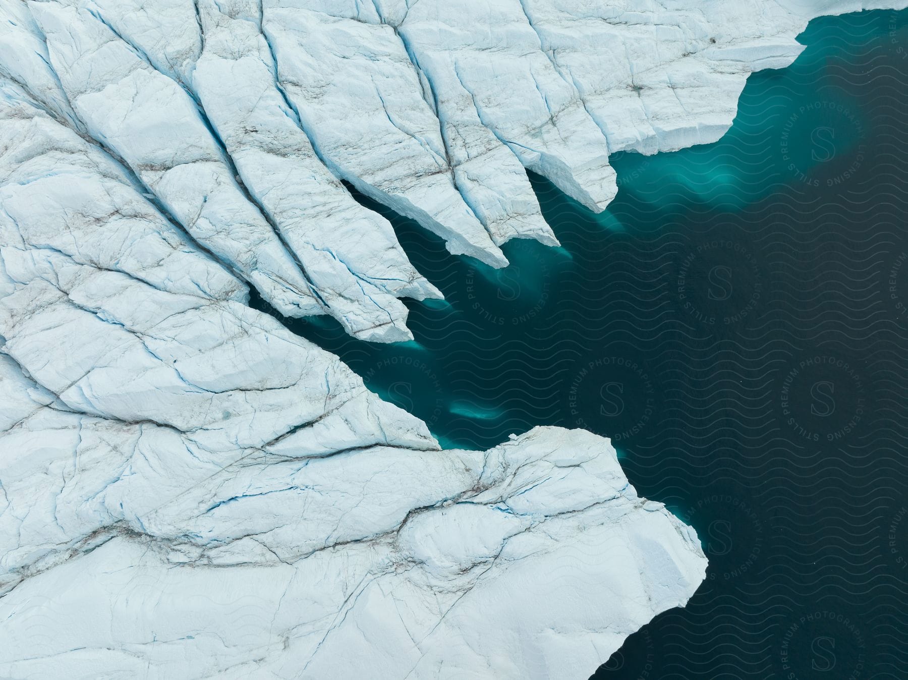 A serene view of a frozen watercourse in greenland