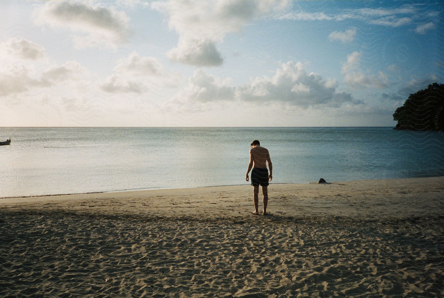 A man standing on the beach