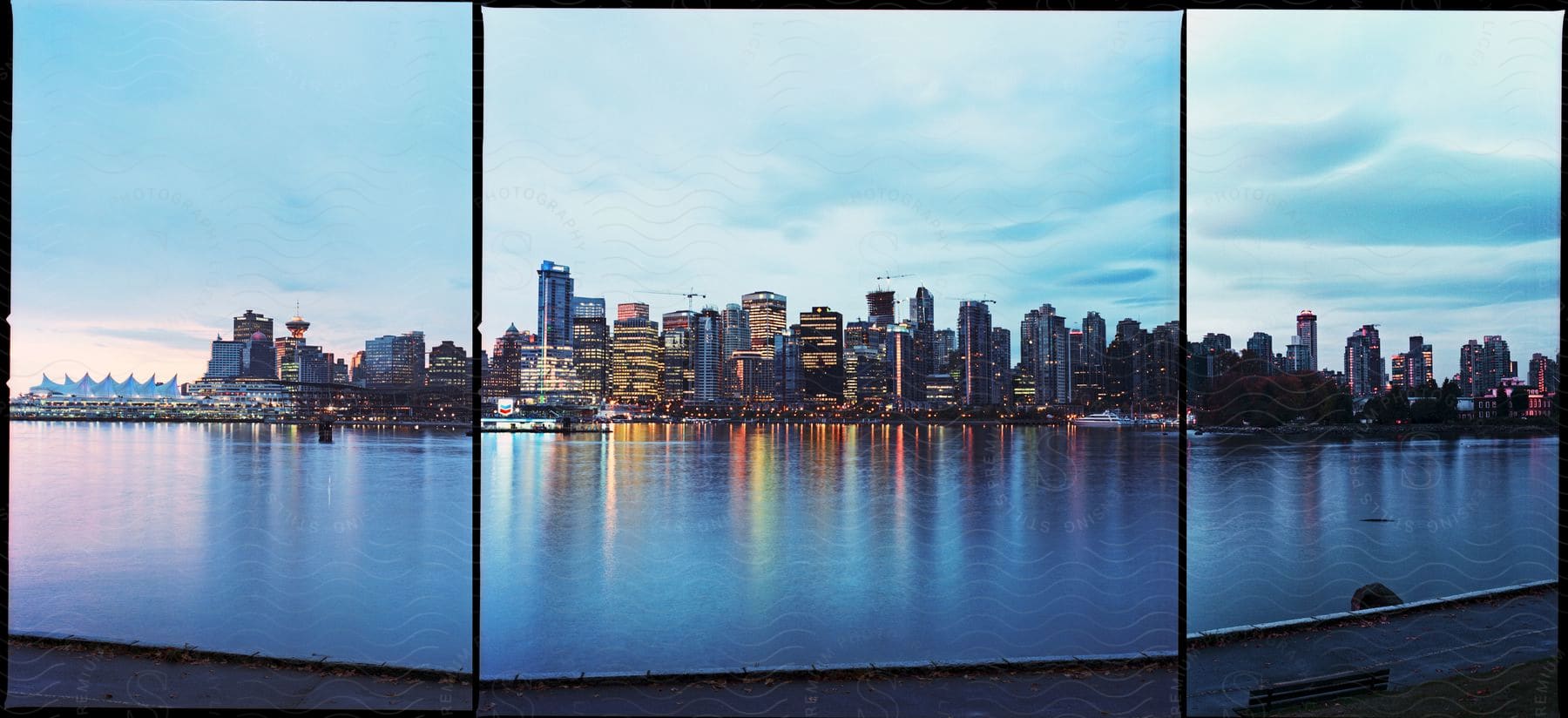 City skyline towering over a river in british columbia canada