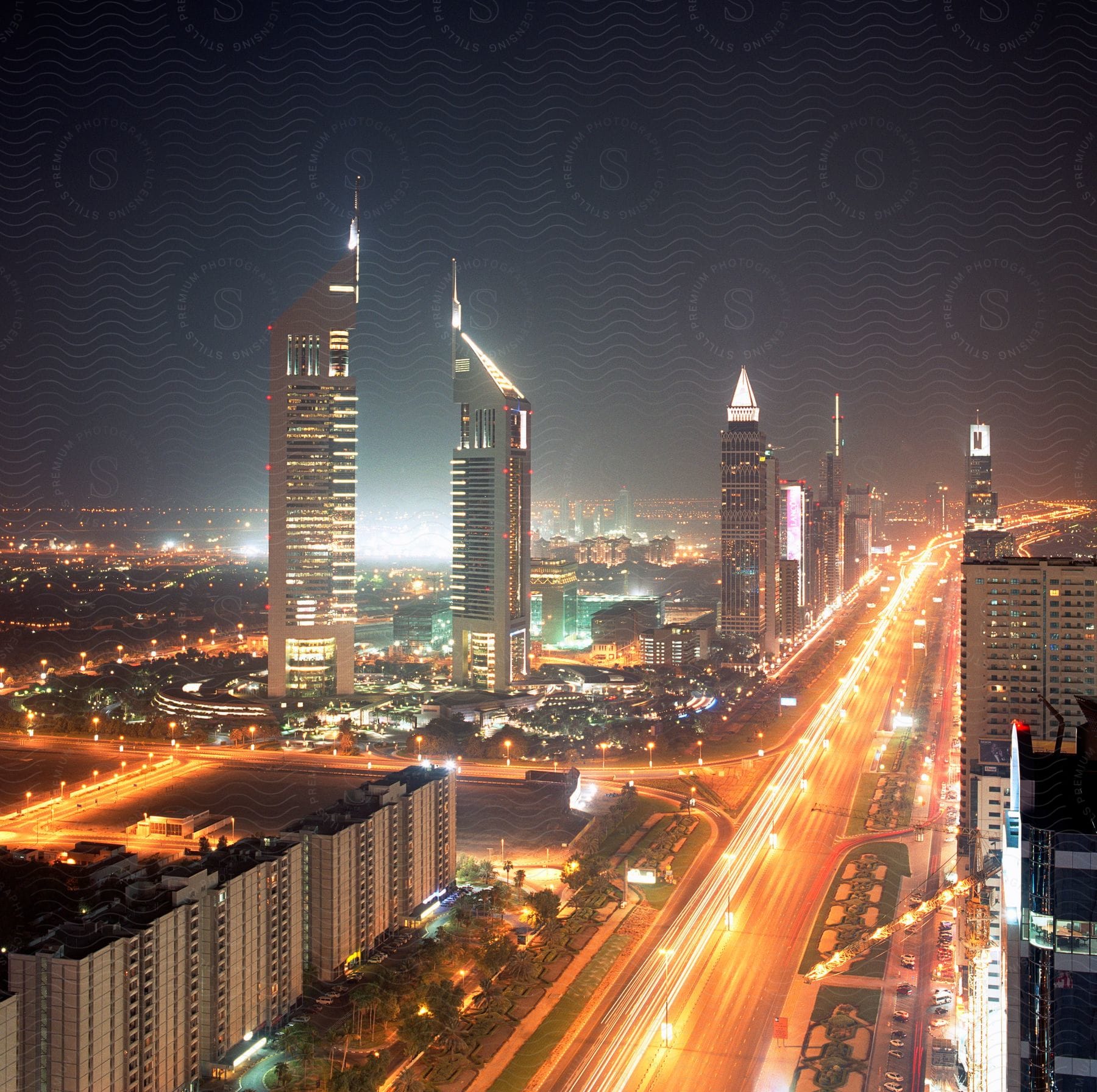 Empty streets in a downtown city at night time as seen from above