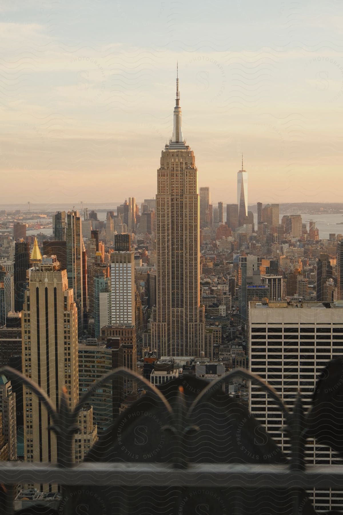 Empire state building seen from a balcony in daylight