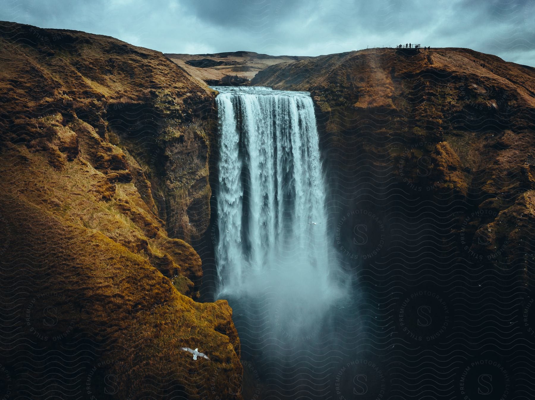 A waterfall cascades down a mountain in iceland