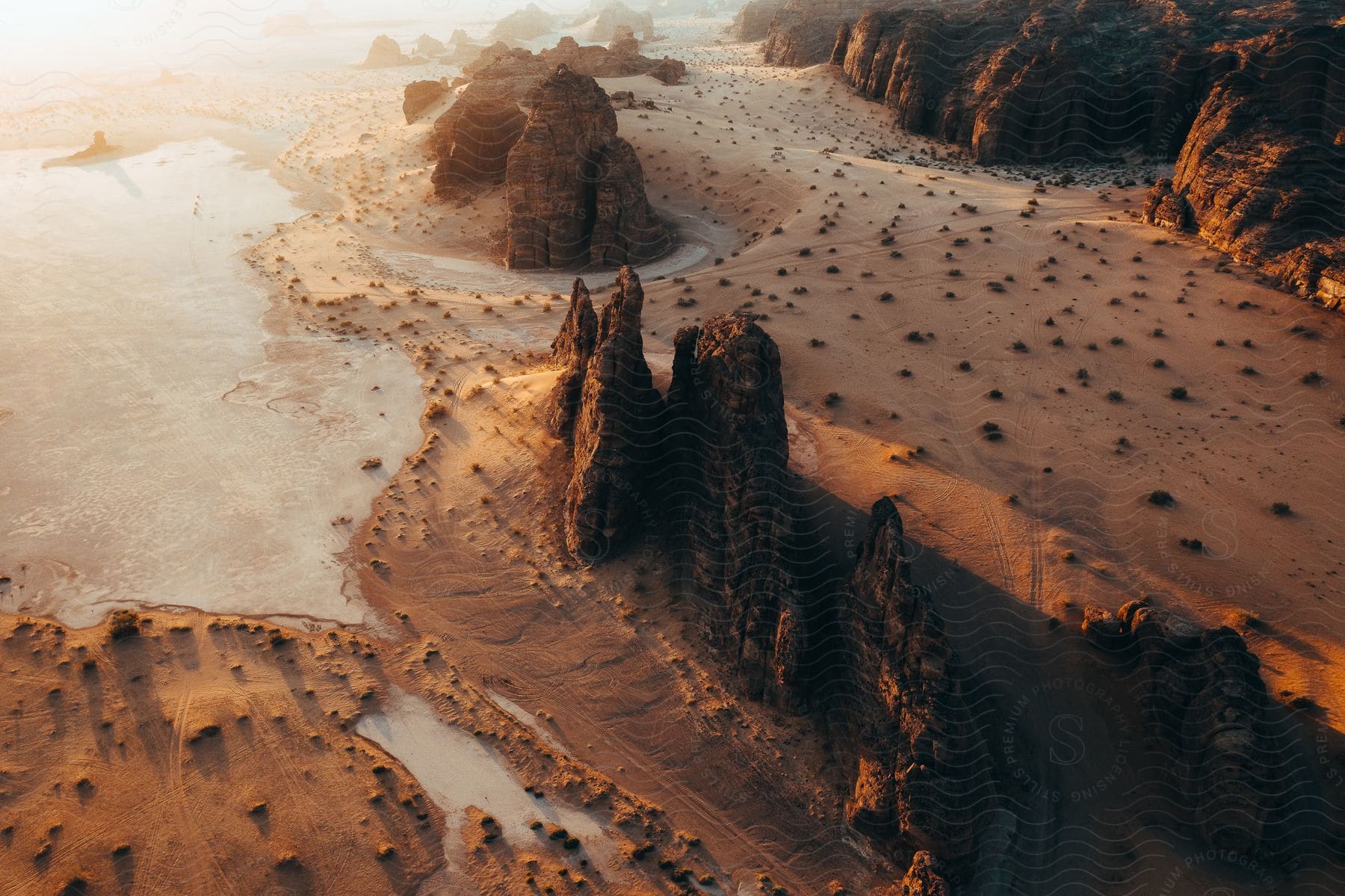 Aerial shot of desert land with huge rock formations