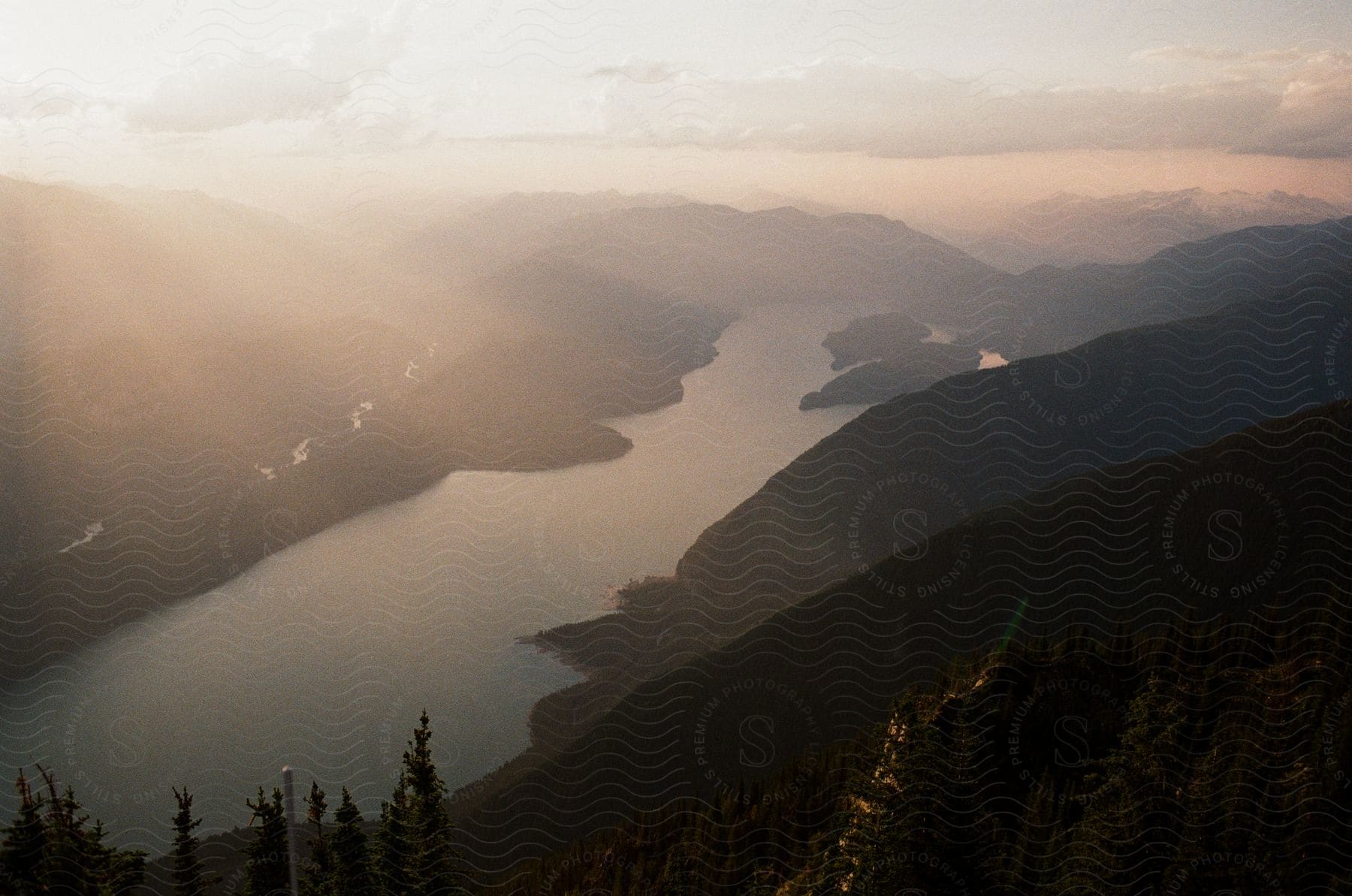 Morning sun illuminating a mountain lake in the canadian rocky mountains