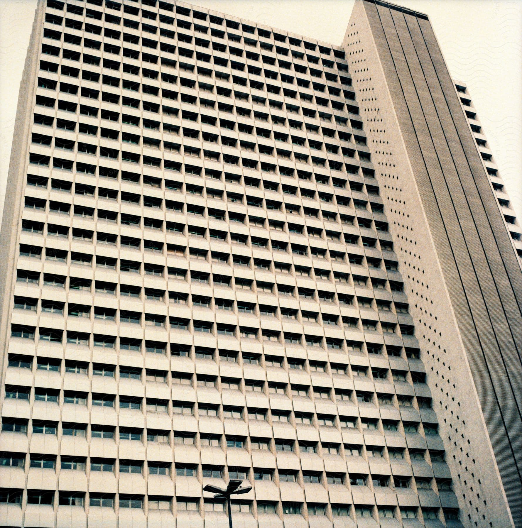 A tall skyscraper with many windows in rio de janeiro brazil