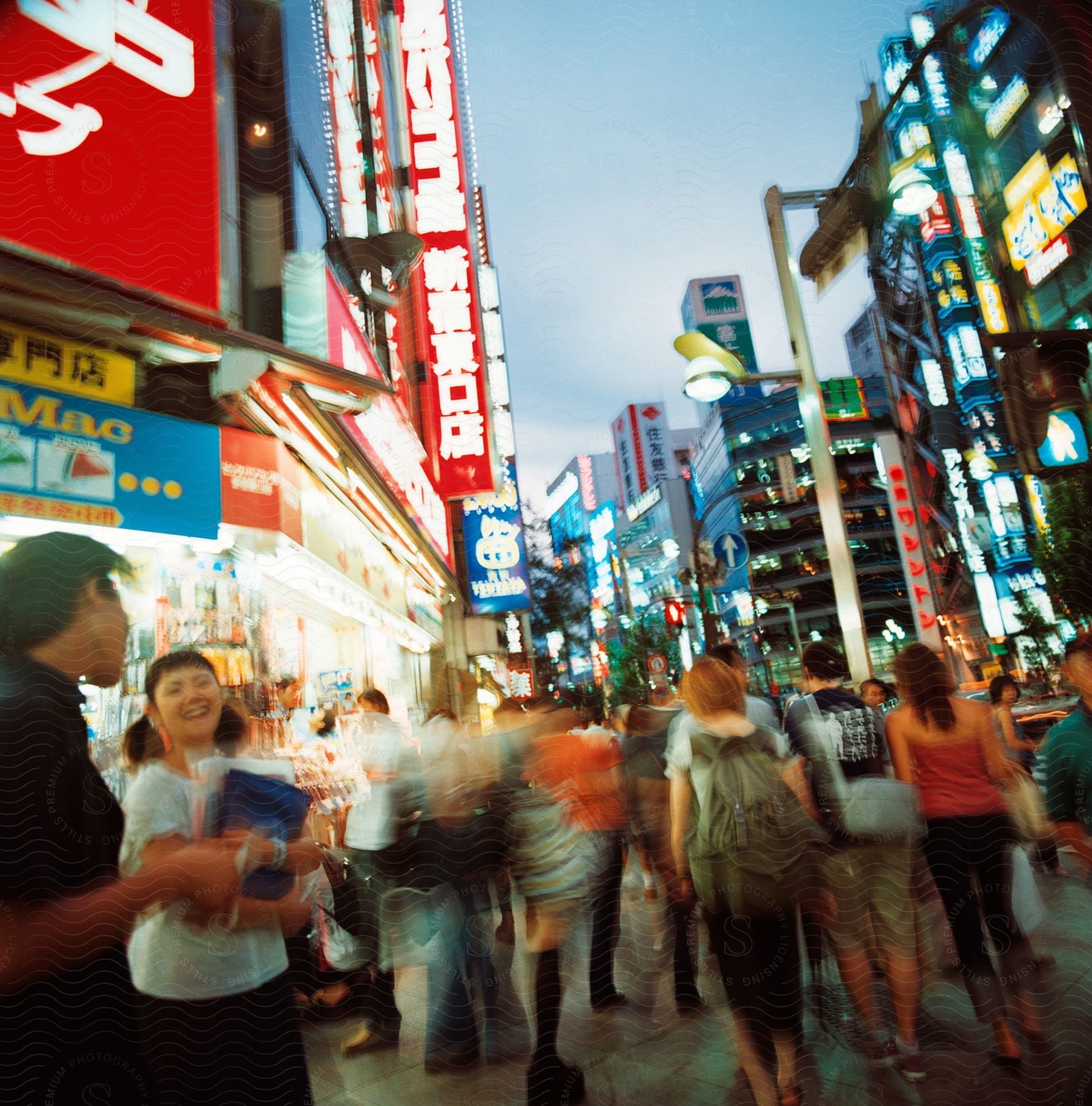 Busy city center with neon sign buildings