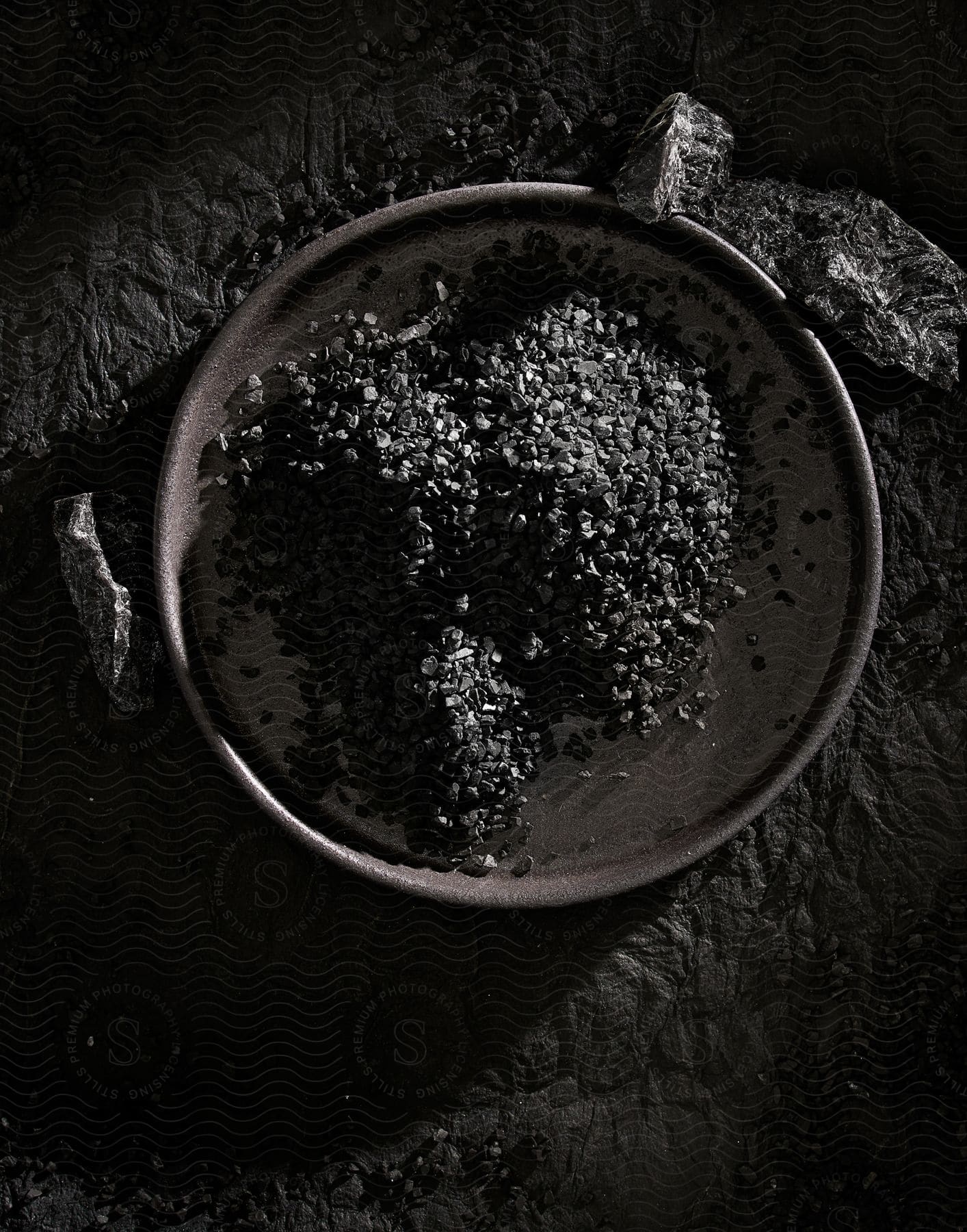 Large bowl of chocolate pieces on a plate