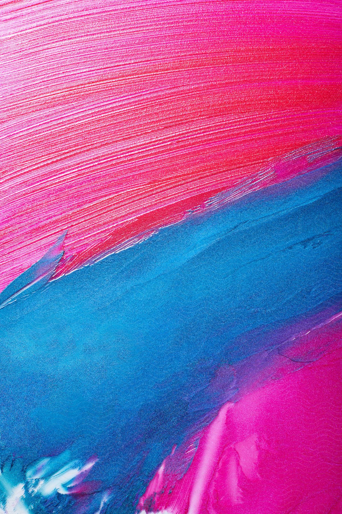 A painting with blue and pink stripes blending together at the edges