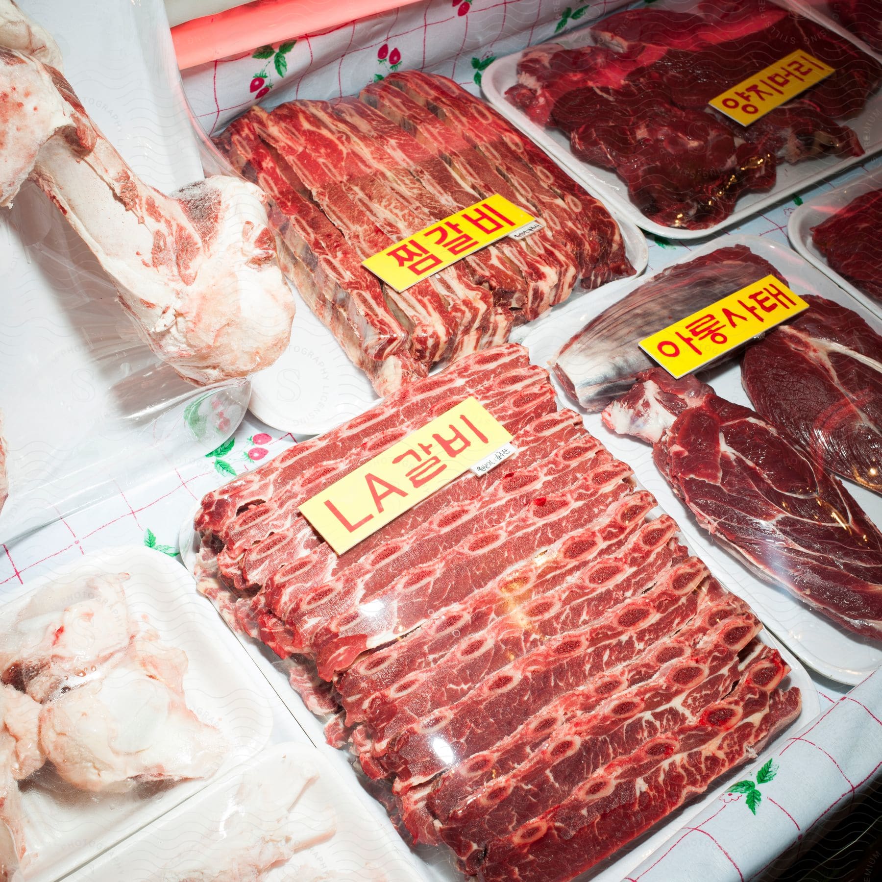 Fresh meat is packaged for sale in a store