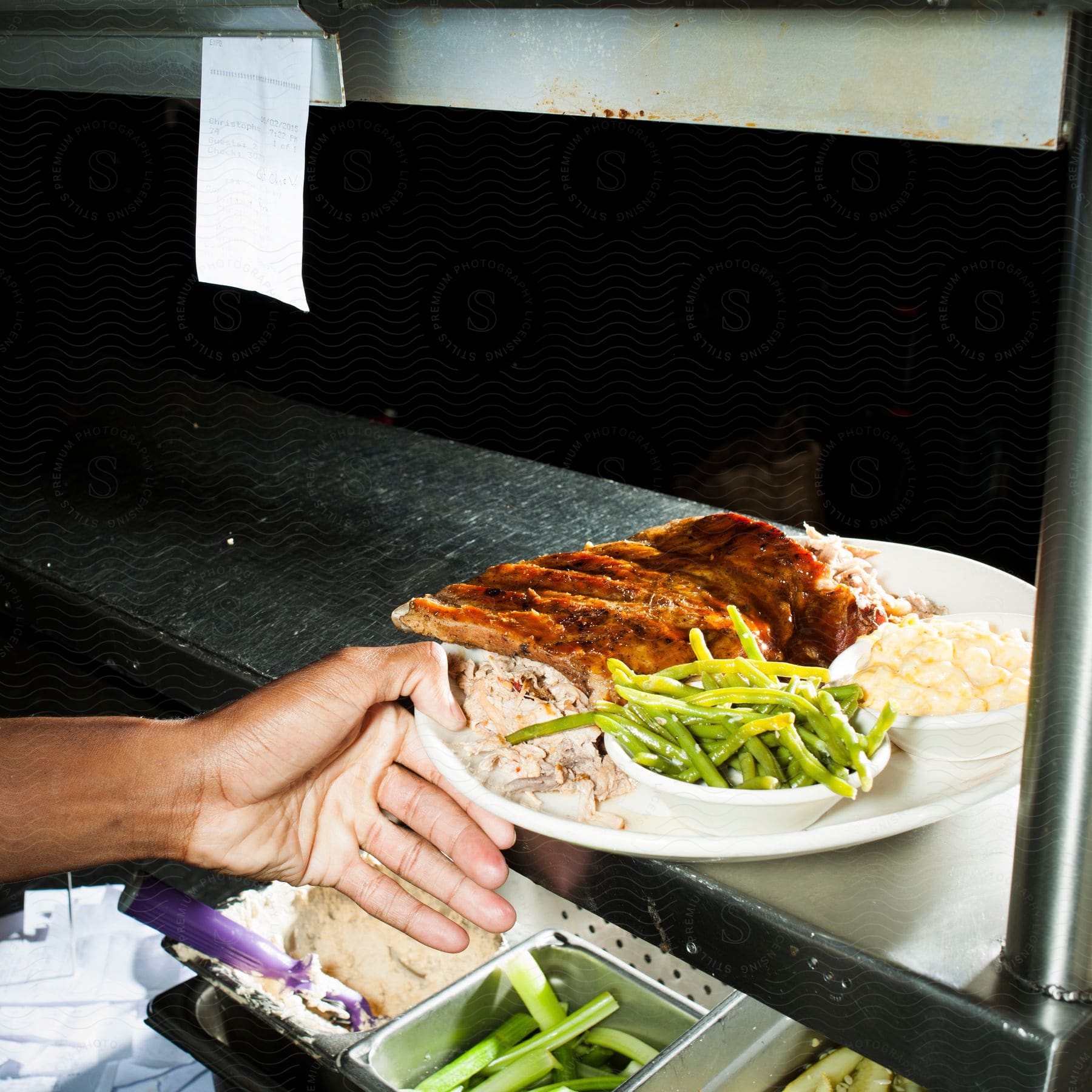 A plate of food ready to be served at a restaurant