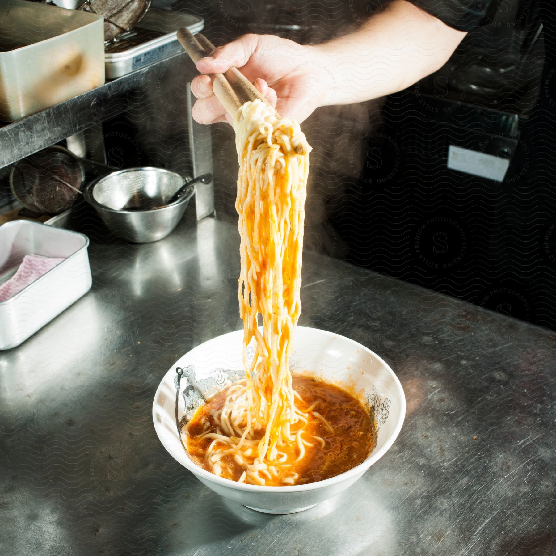 Stock photo of a bowl of karashibi miso ramen soup with noodles served on a table