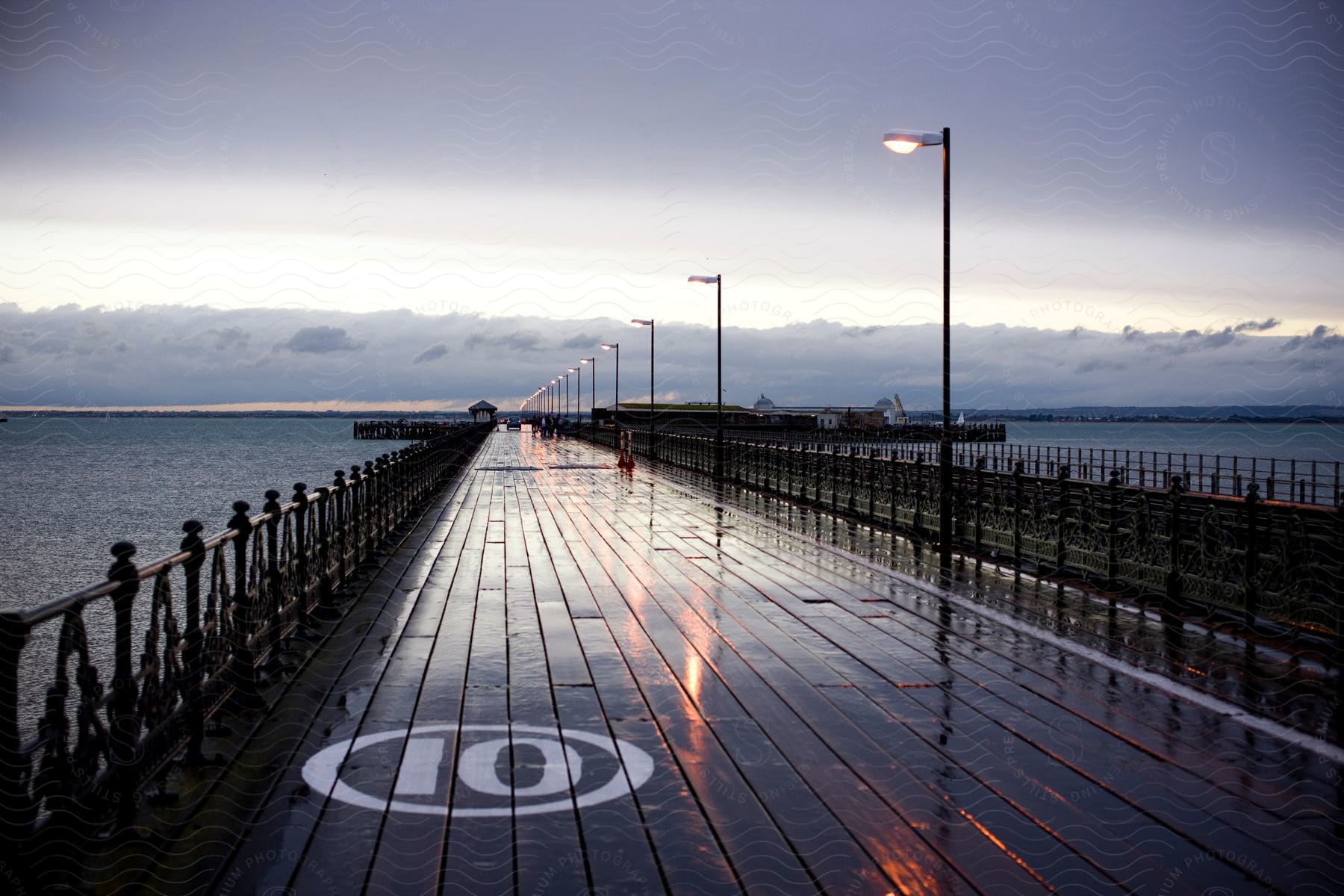 A wooden bay bridge at dusk