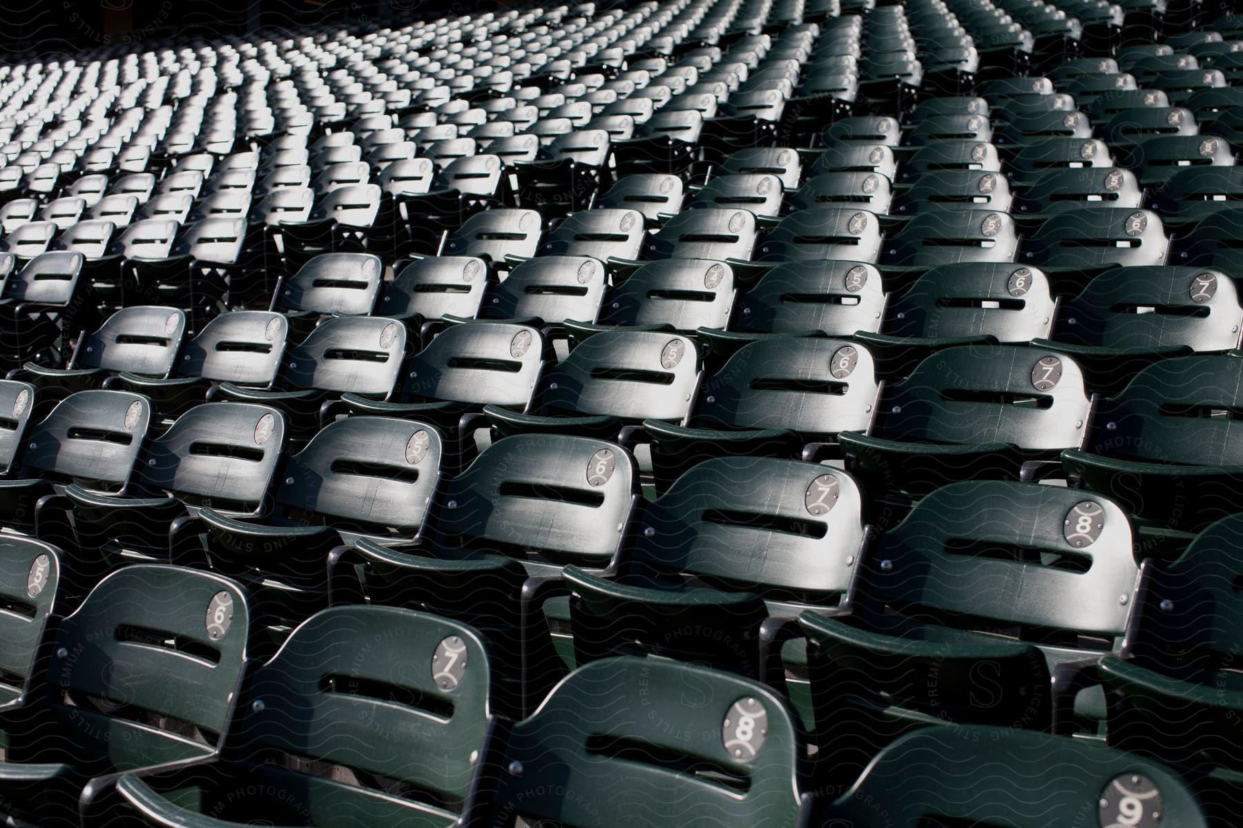 Large empty auditorium with hundreds of rows of chairs