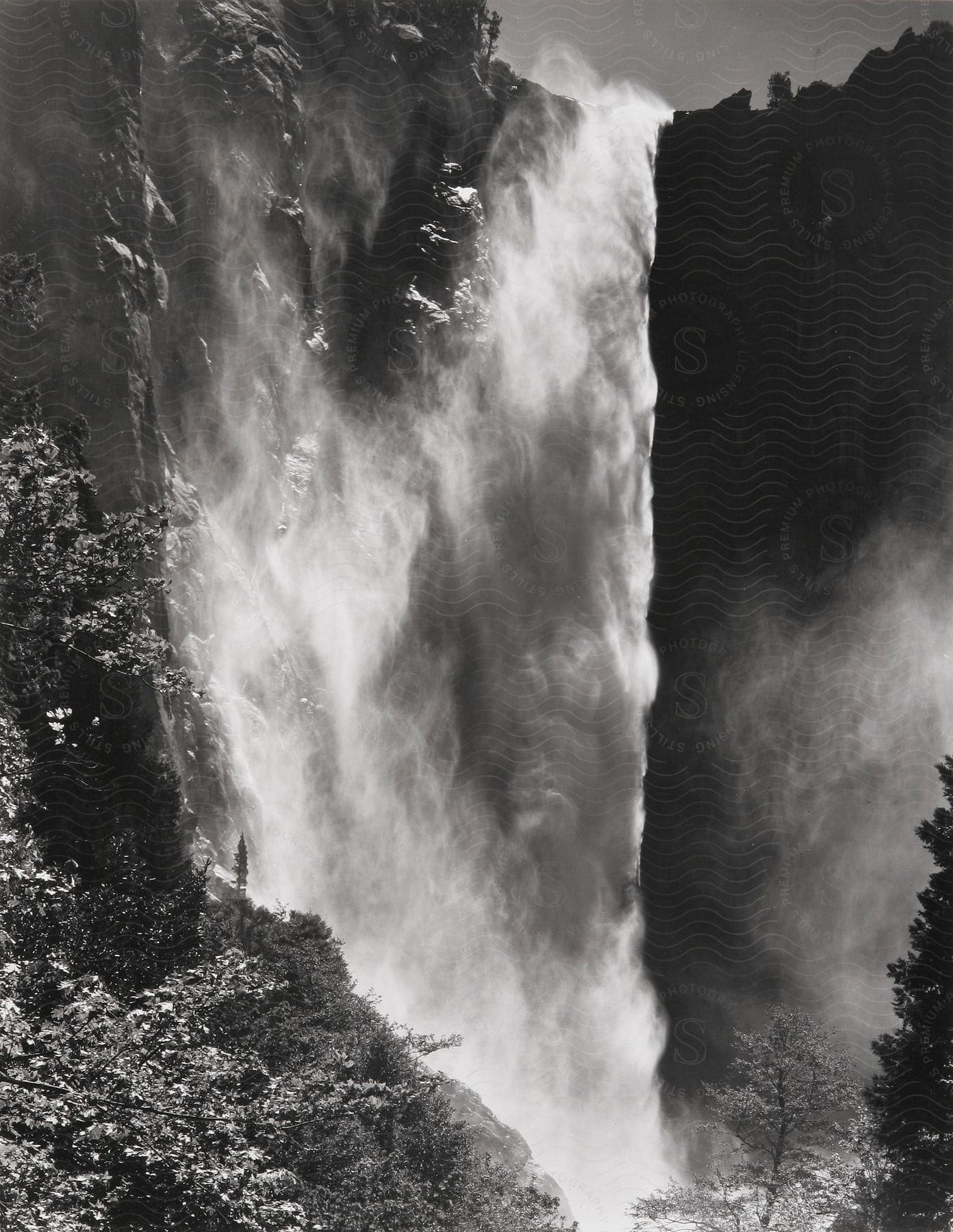 Stock photo of a rushing waterfall in black and white