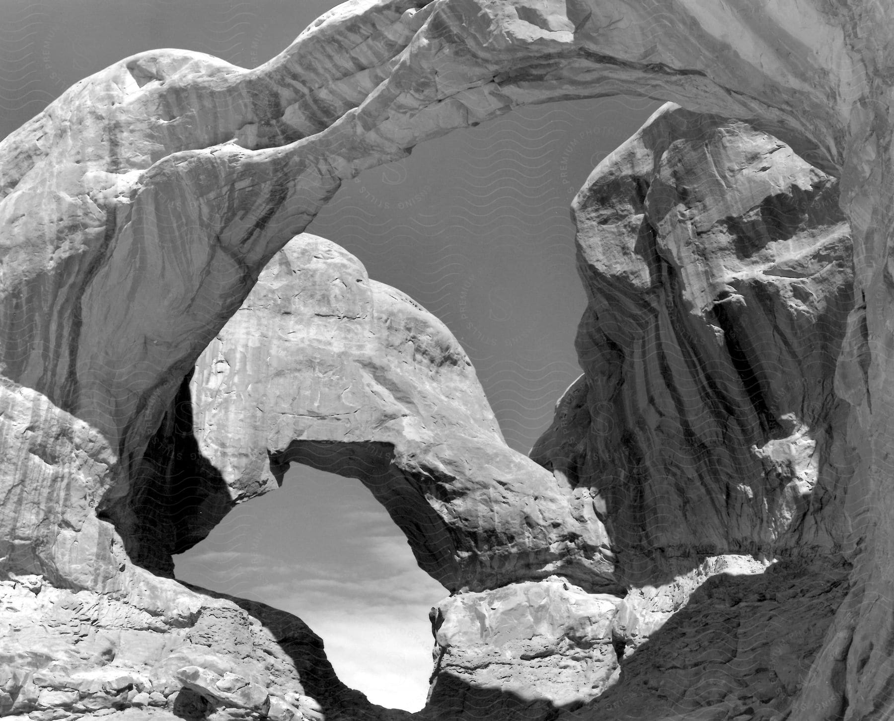 Geological arch formations in rock canyons