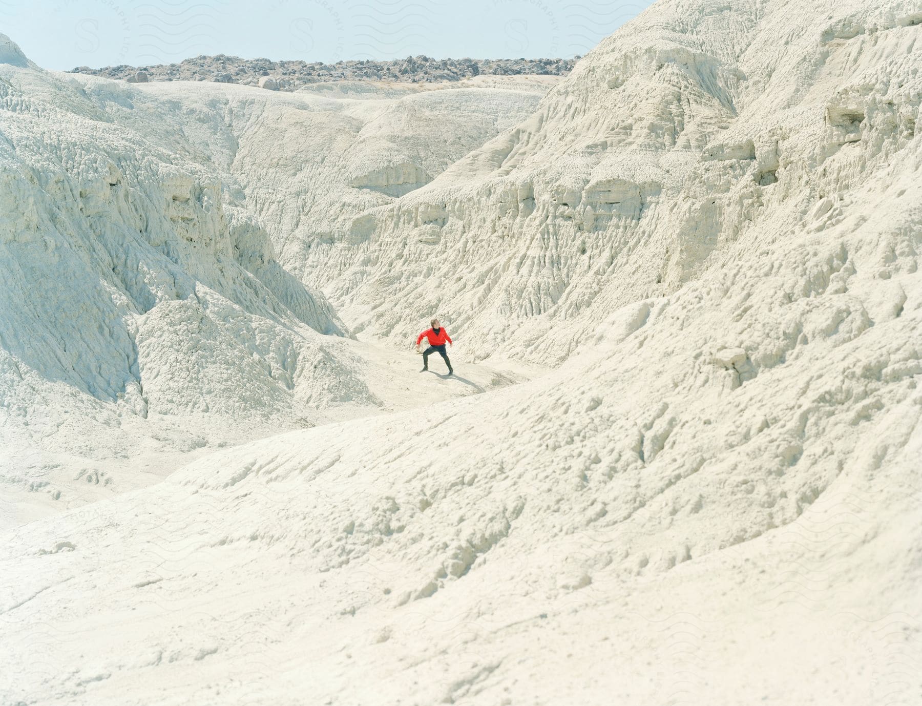 A person is hiking through the wilderness