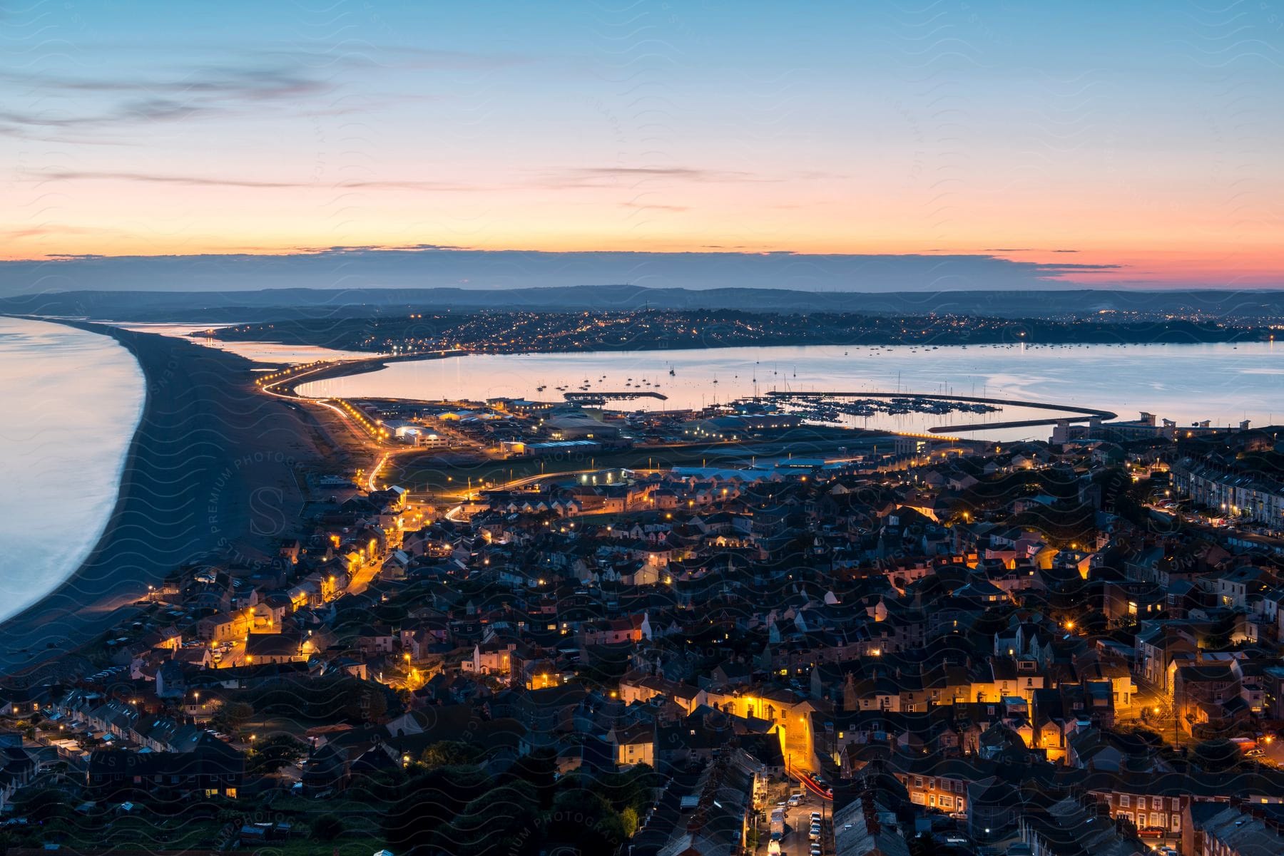 A downtown city at sunset seen from above