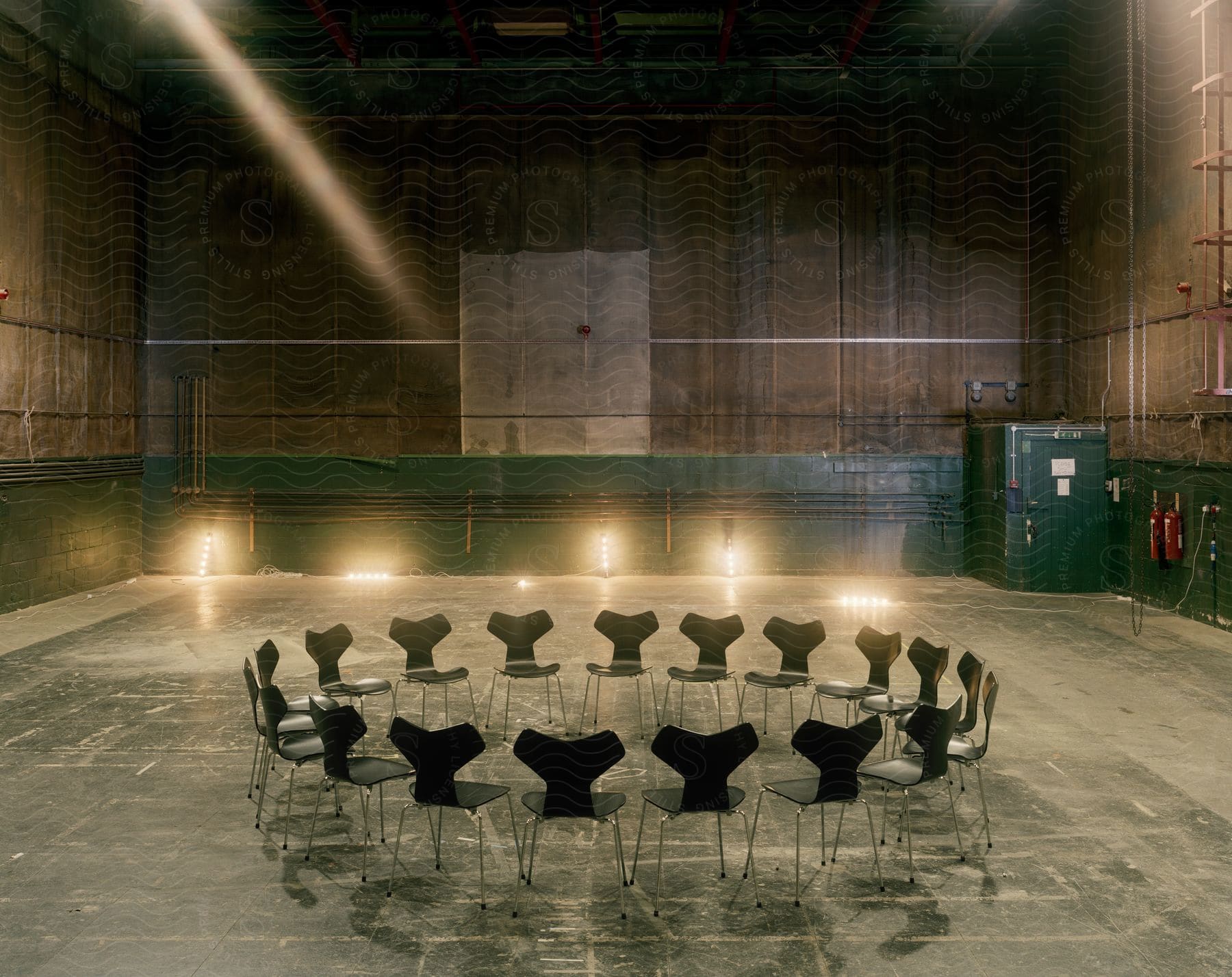 A hall with chairs arranged in a circle