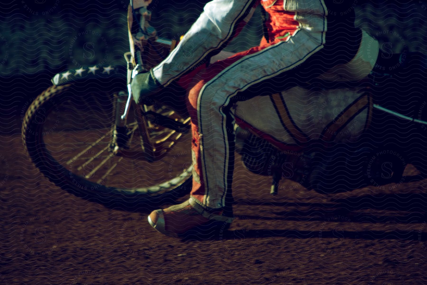 A man races on a dirt bike