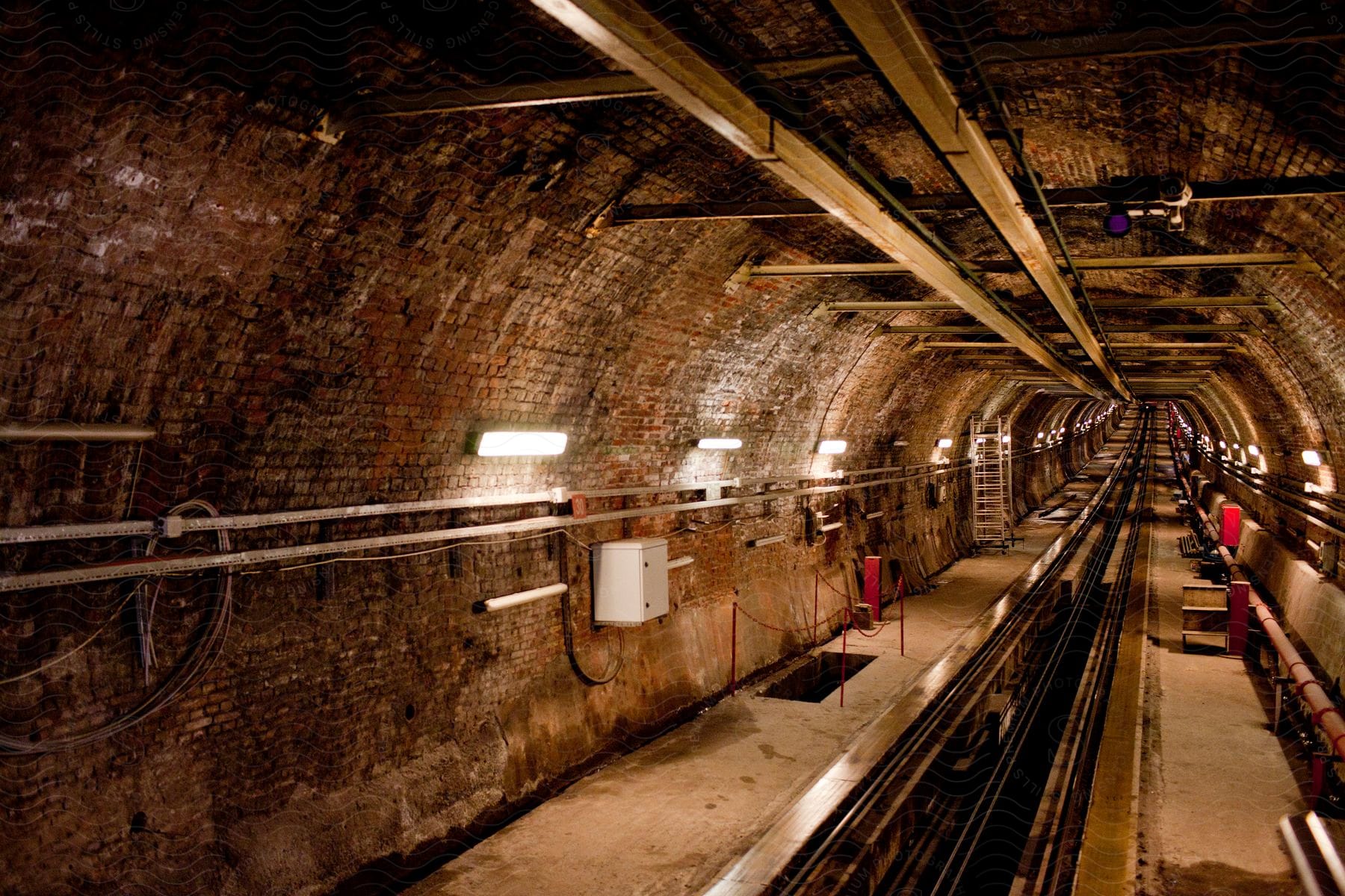 A subway tunnel with lights