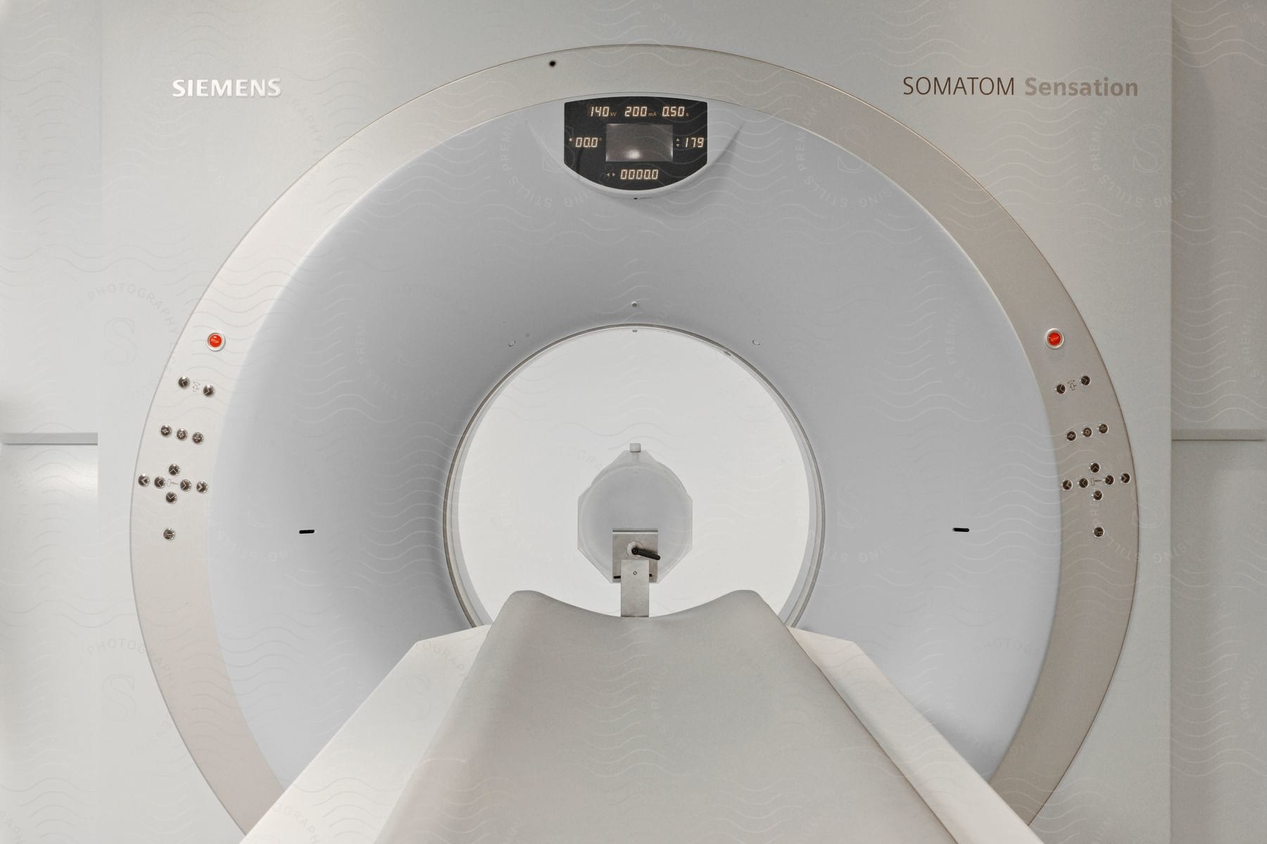 Exam room with tomography machine