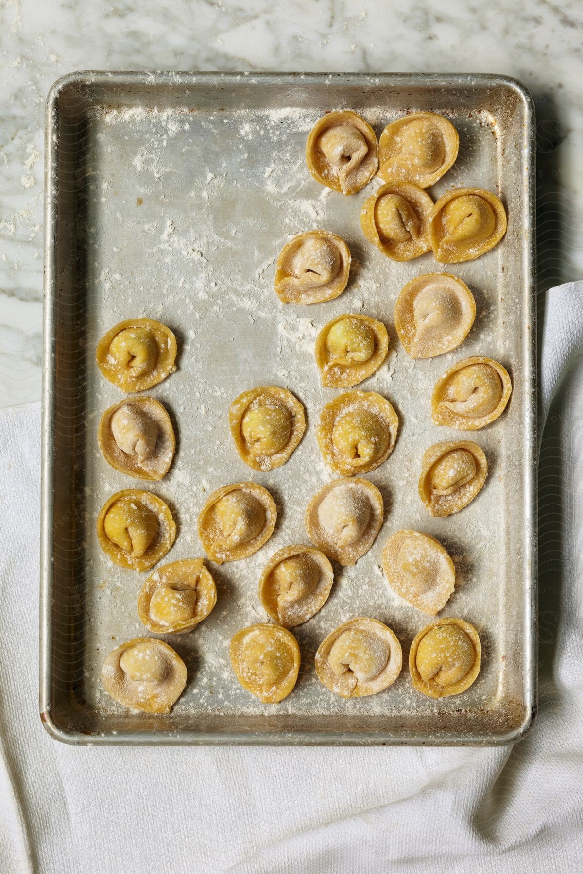 Stock photo of a neutral pastry on a golden plate in a kitchen pan