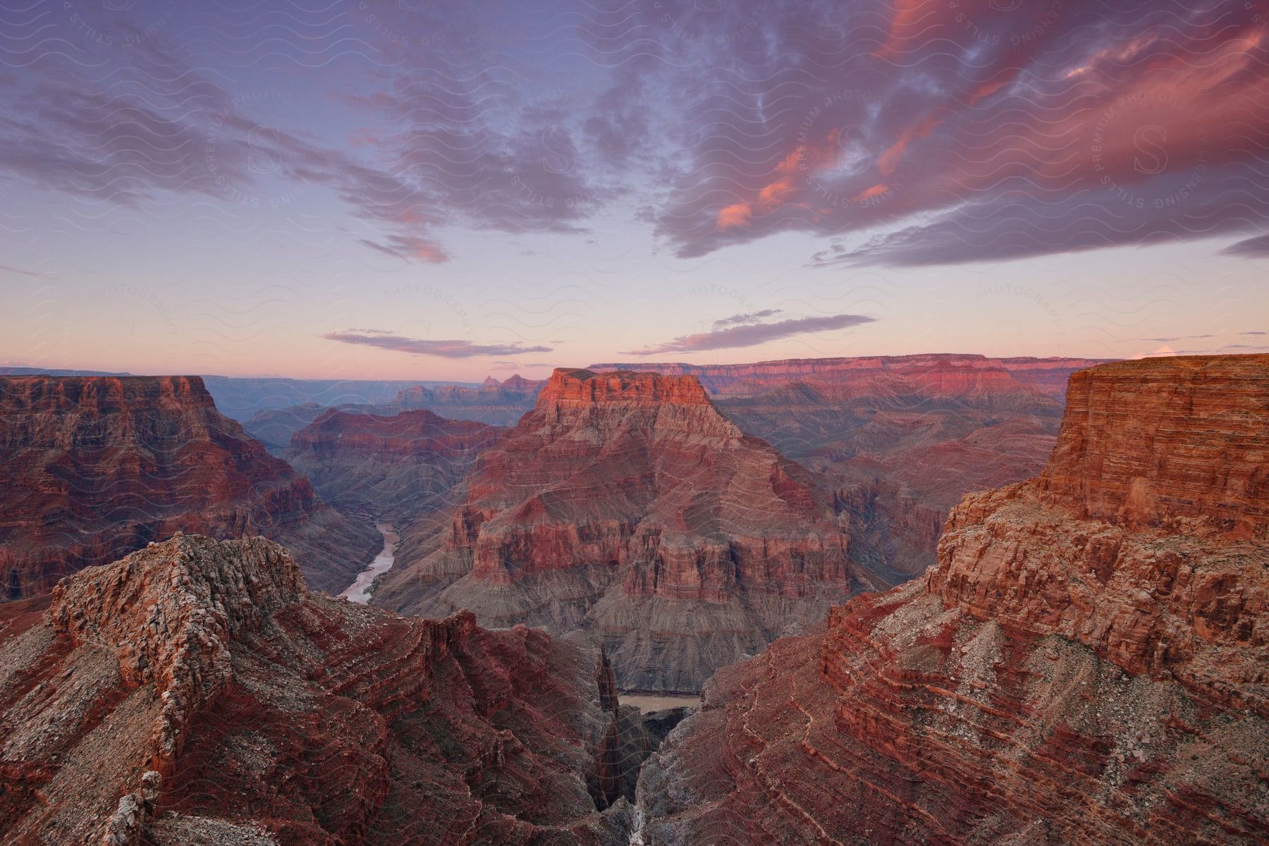 Sunset over red rock plateaus and canyons of grand canyon national park