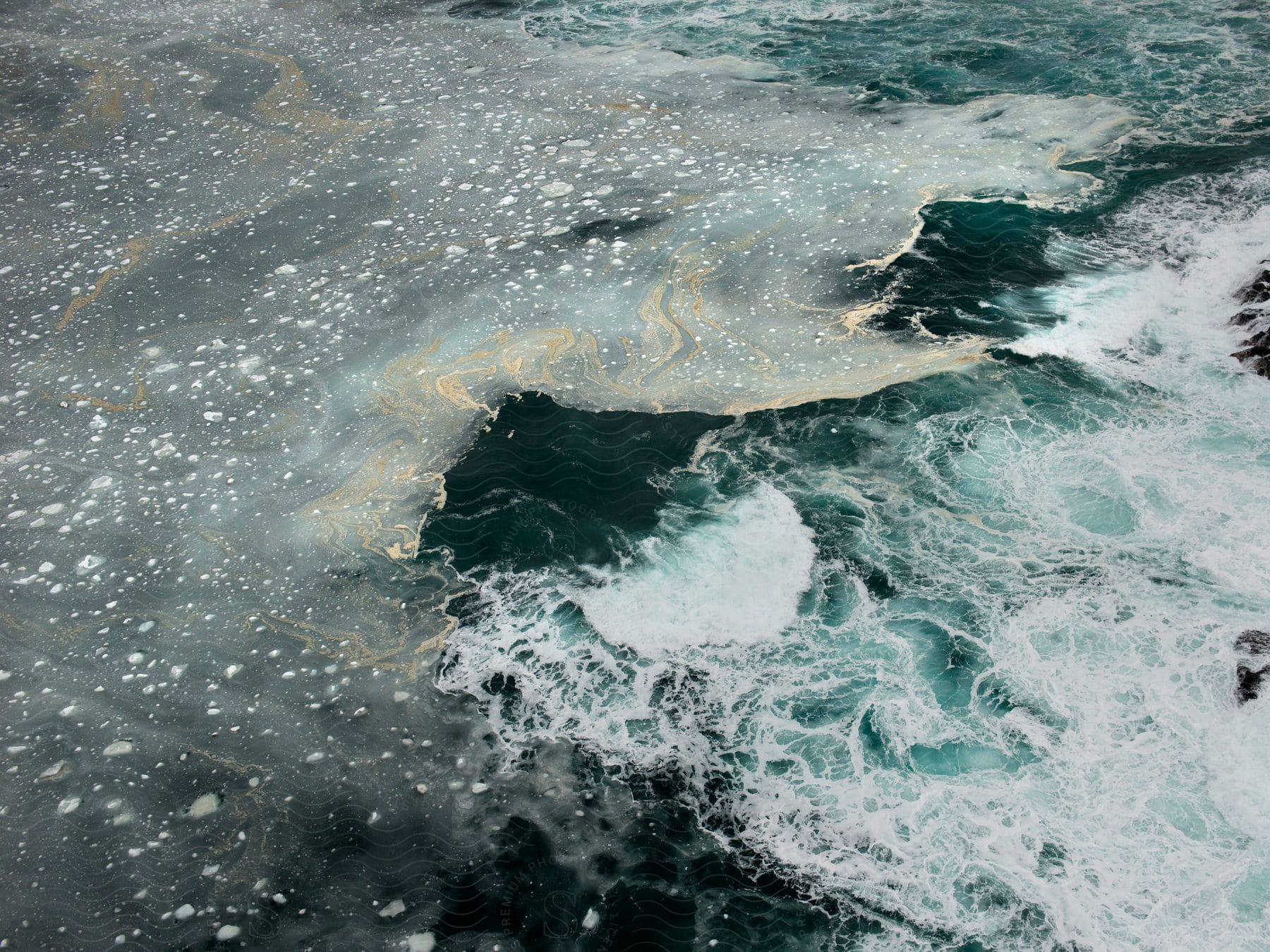 Ocean waves of many colors crashing from above