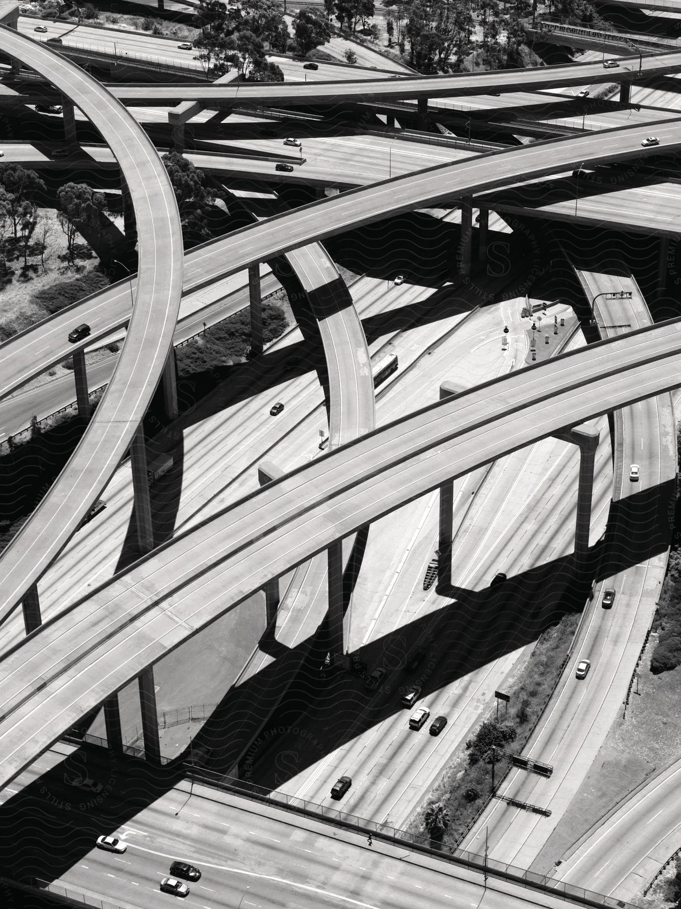 A modern designed bridge over a freeway at daytime