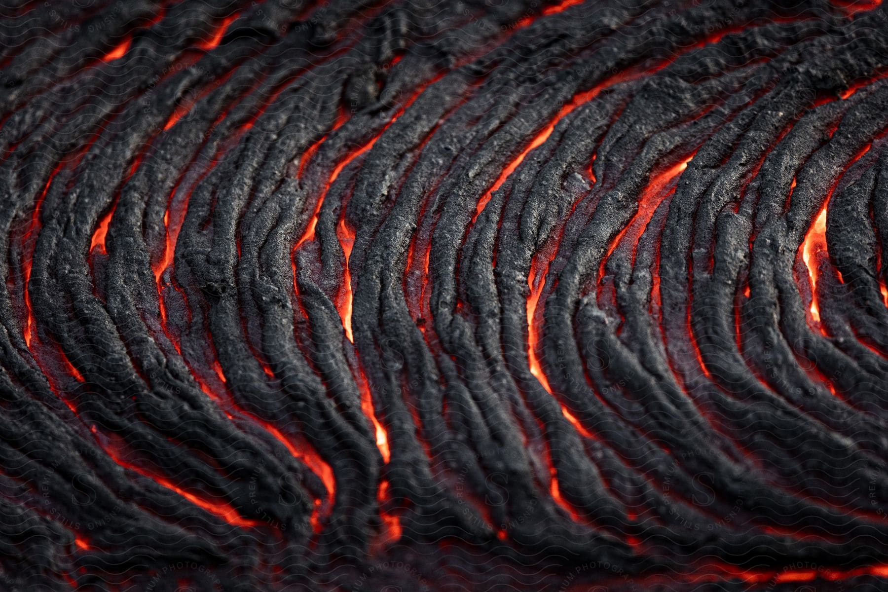 Magma cools on the surface into igneous rock in this nature image taken during a volcanic eruption in iceland