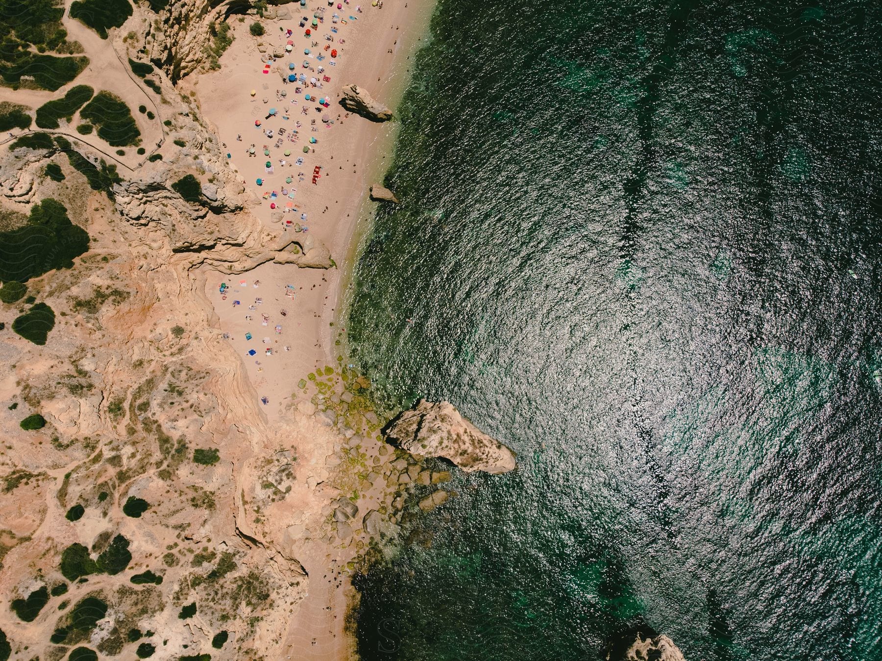 A crowded beach seen from above