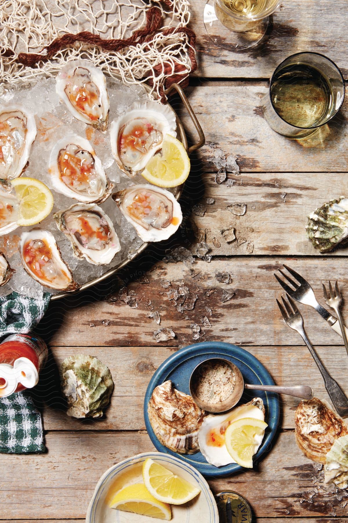 Oysters garnished with lemon on a plate