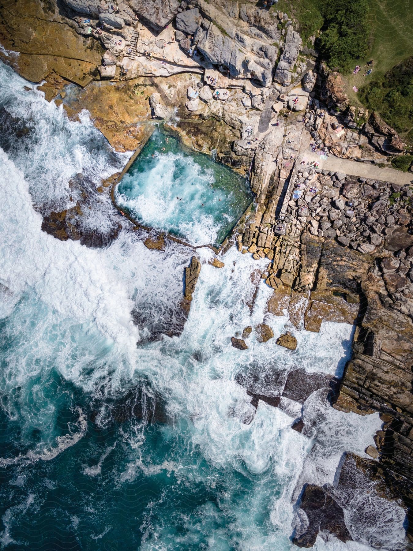 A raging river with waves flowing through canyons and rocks