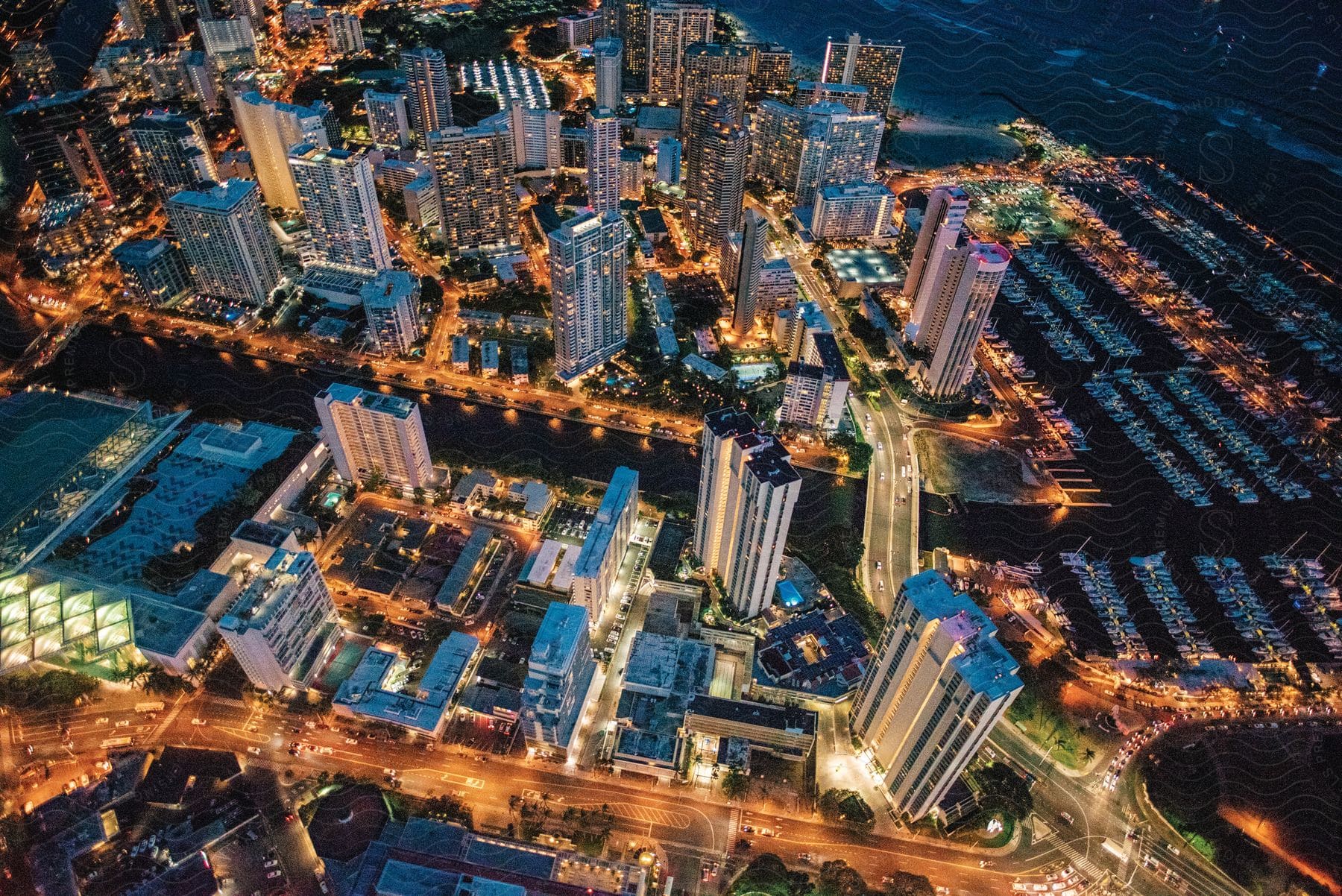 An aerial perspective of a large city located by the water