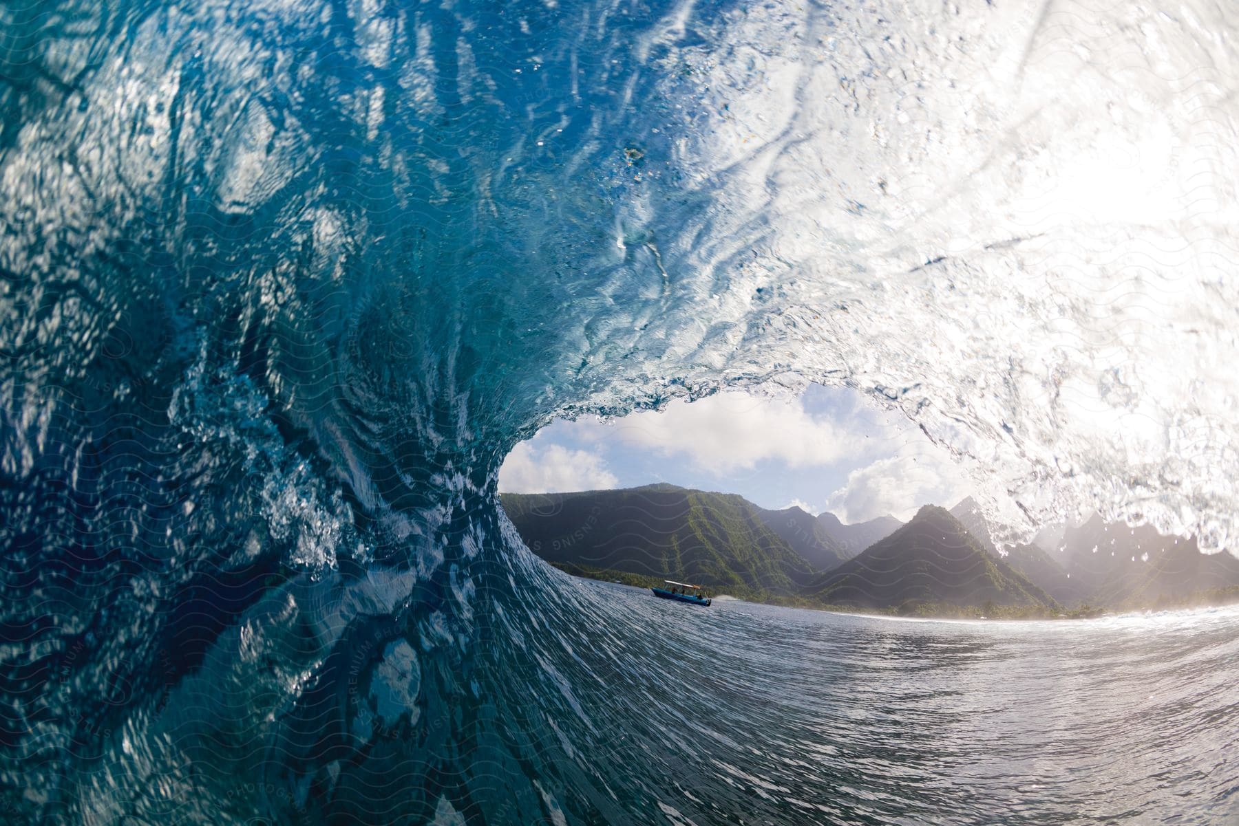 A boat seen from underneath a crashing wave