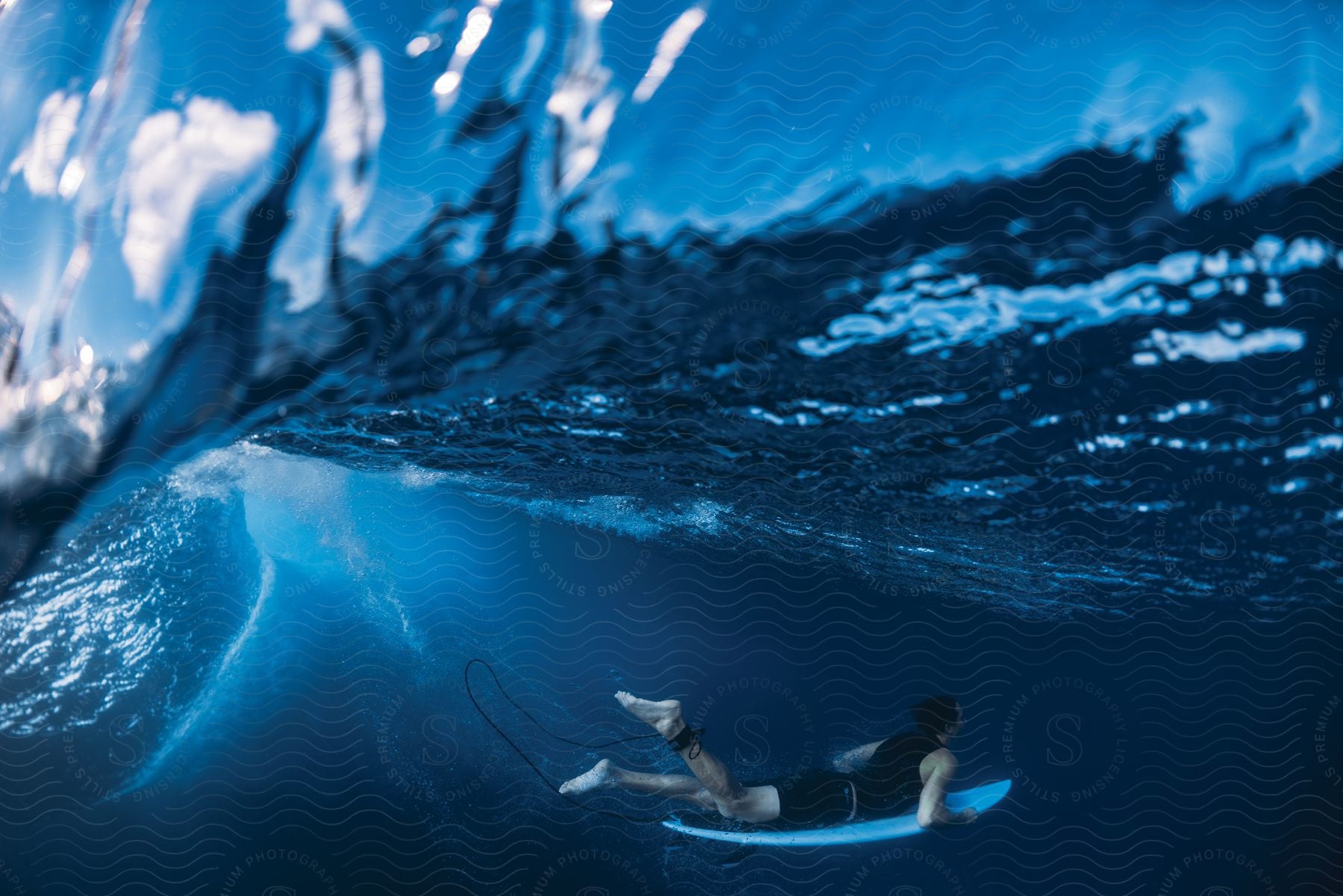 A person surfing in the ocean waves