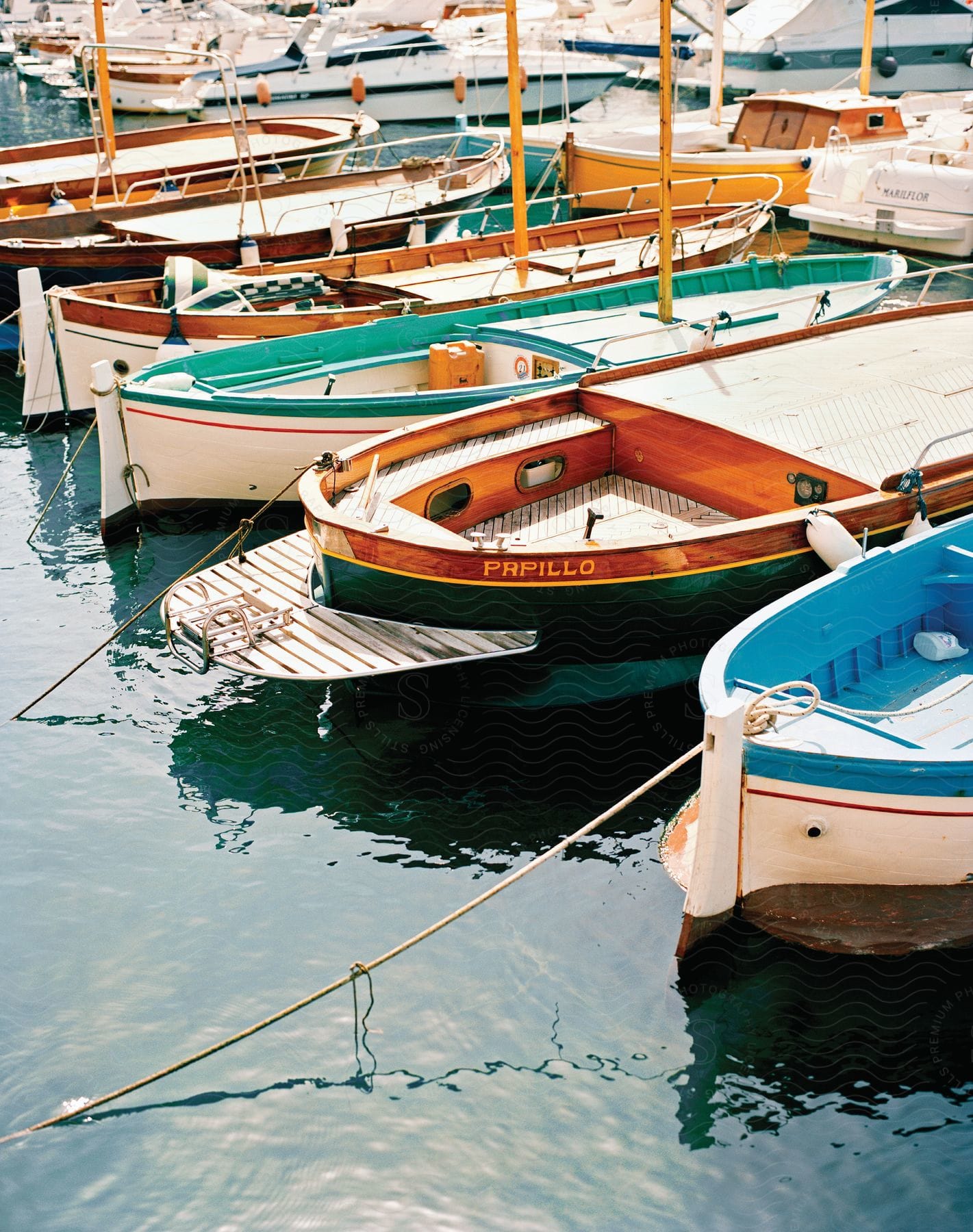 A series of boats docked on shore