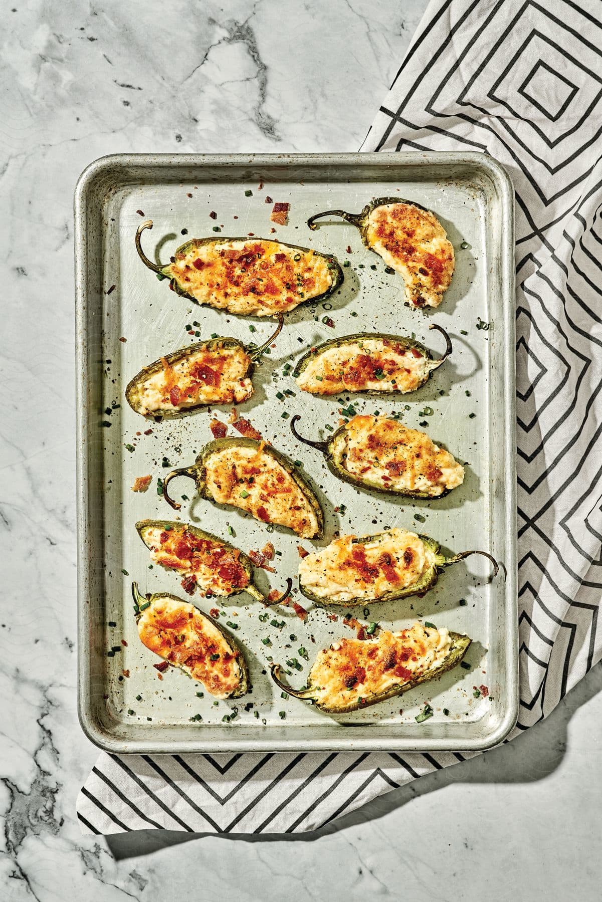 Stock photo of close up of a tray of jalapeño poppers