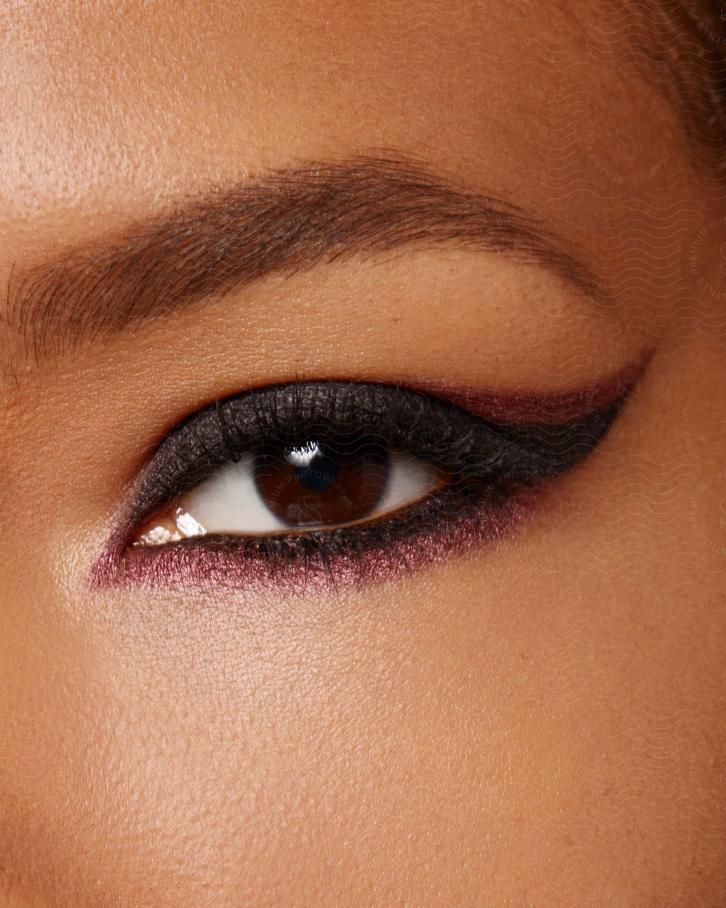 Close up of a womans eye with egyptian eyeliner