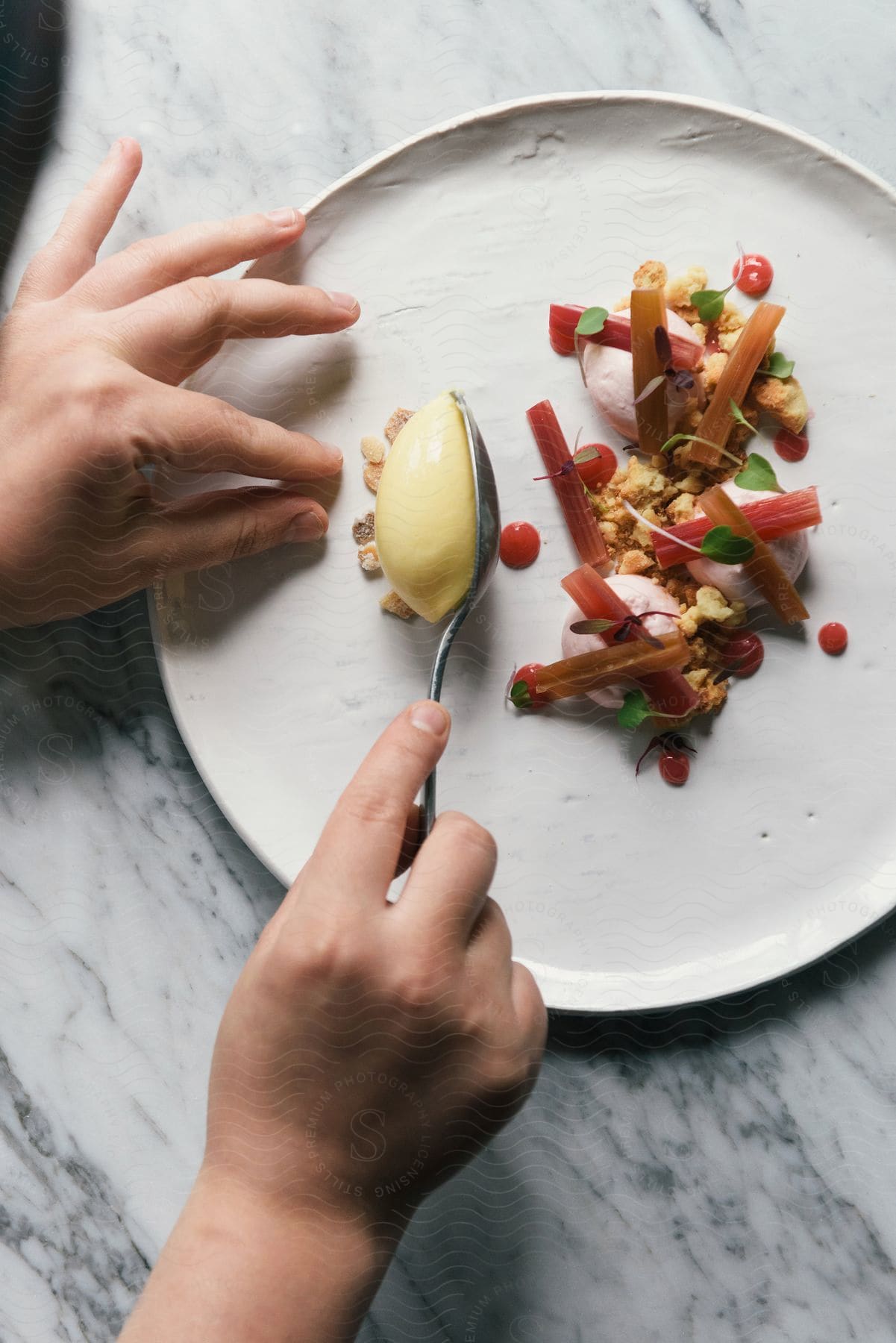 A person holding a plate of food