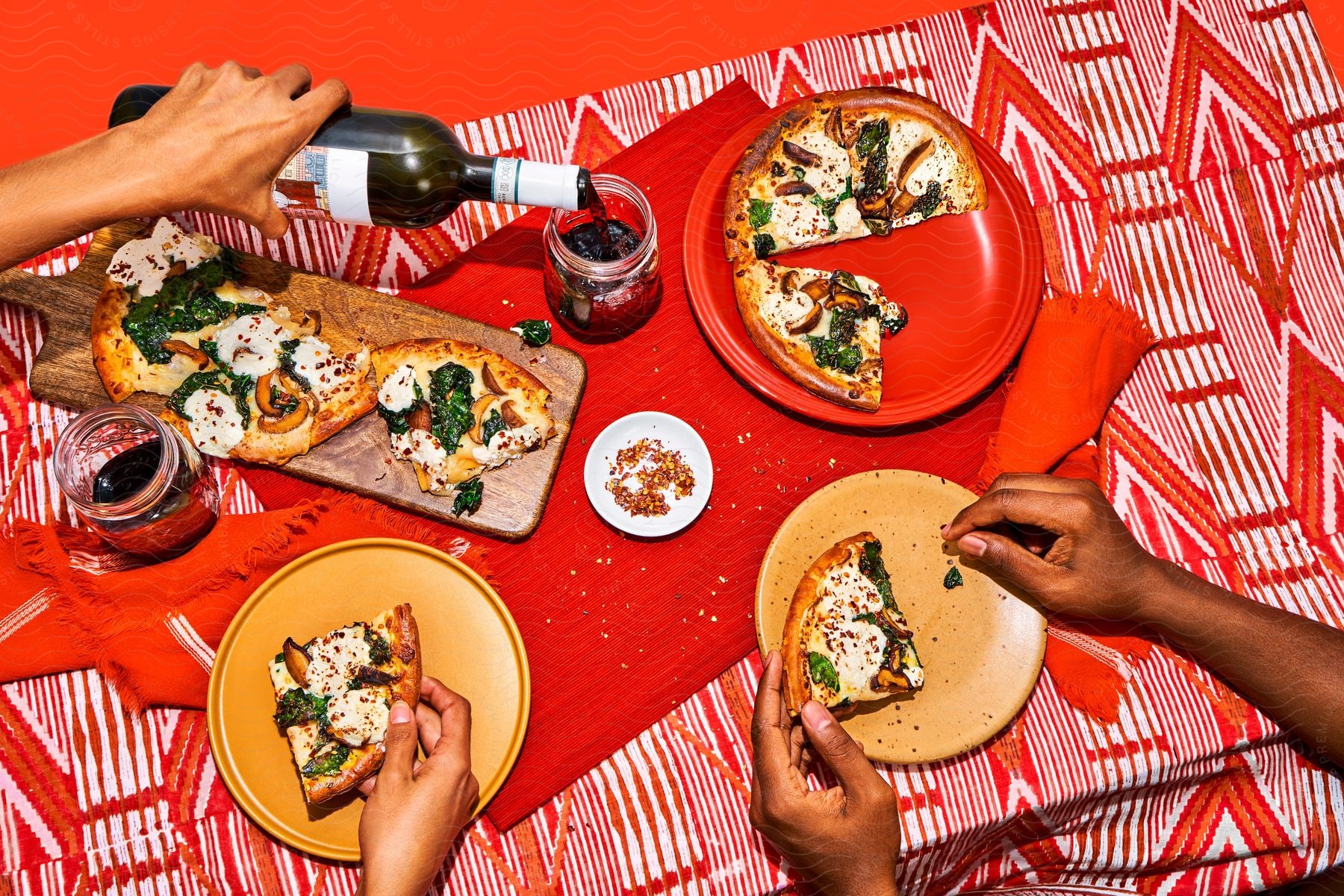 Three people enjoying a pizza meal together