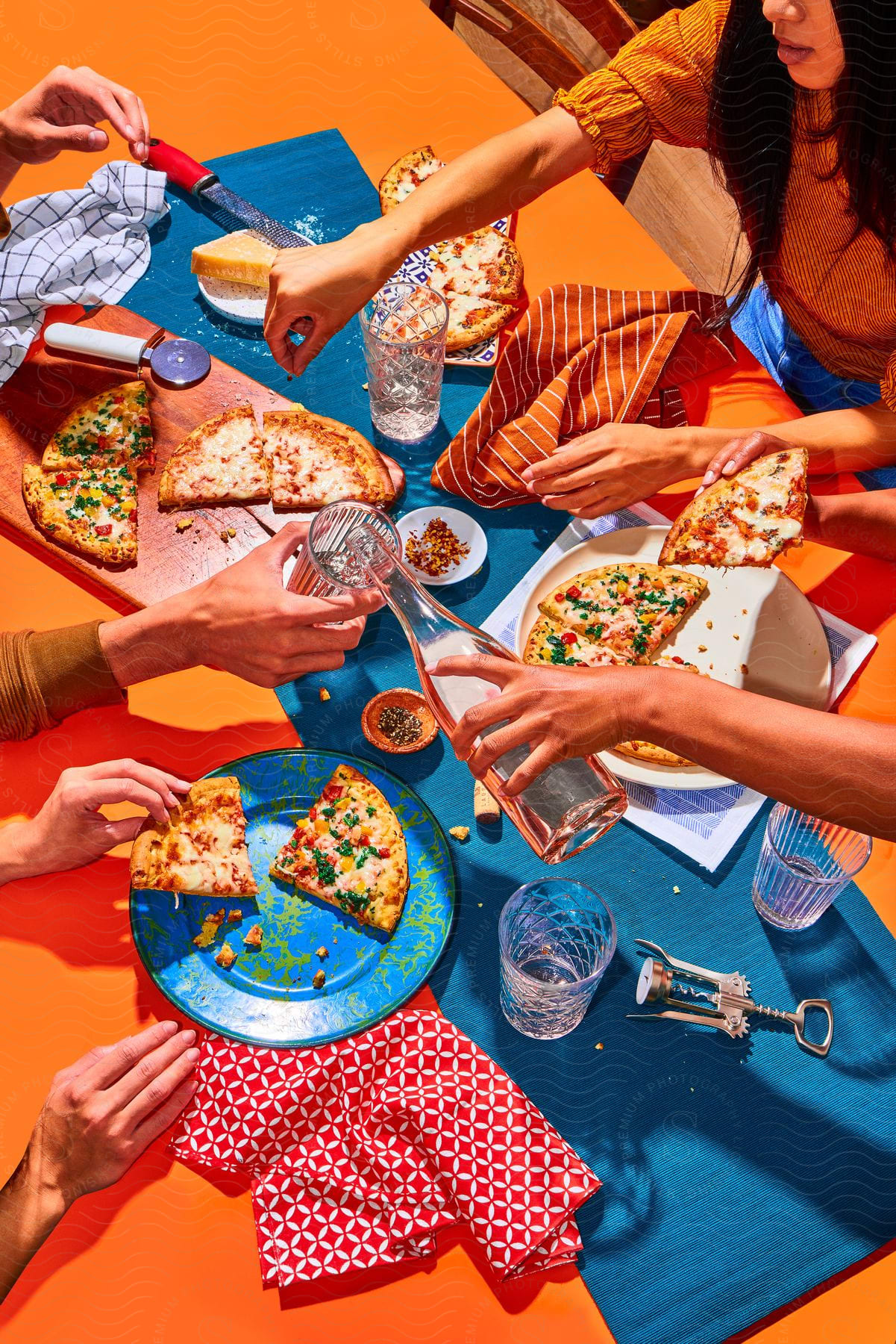 A group enjoying a pizza meal together
