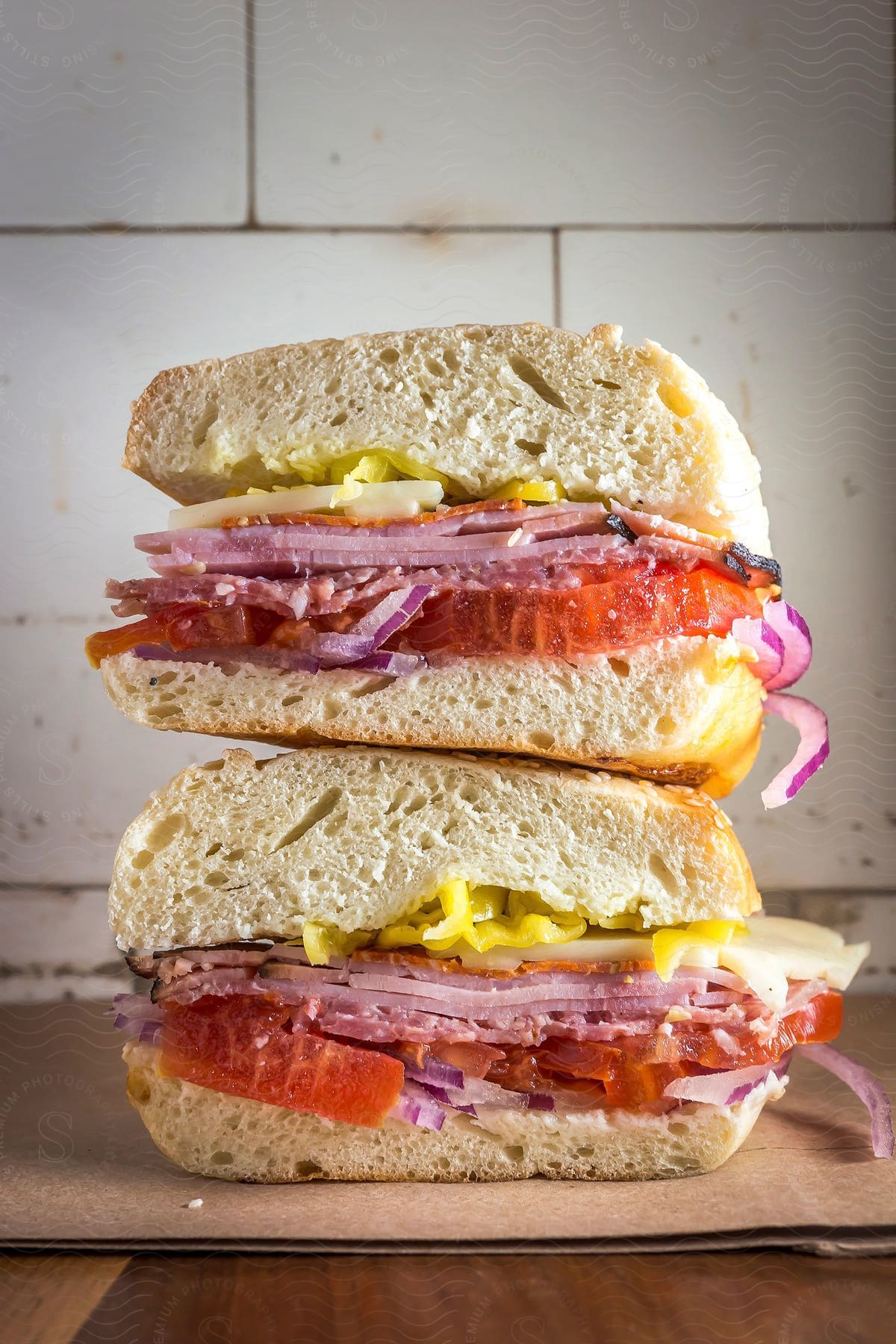 A sandwich on a plate with food and tableware